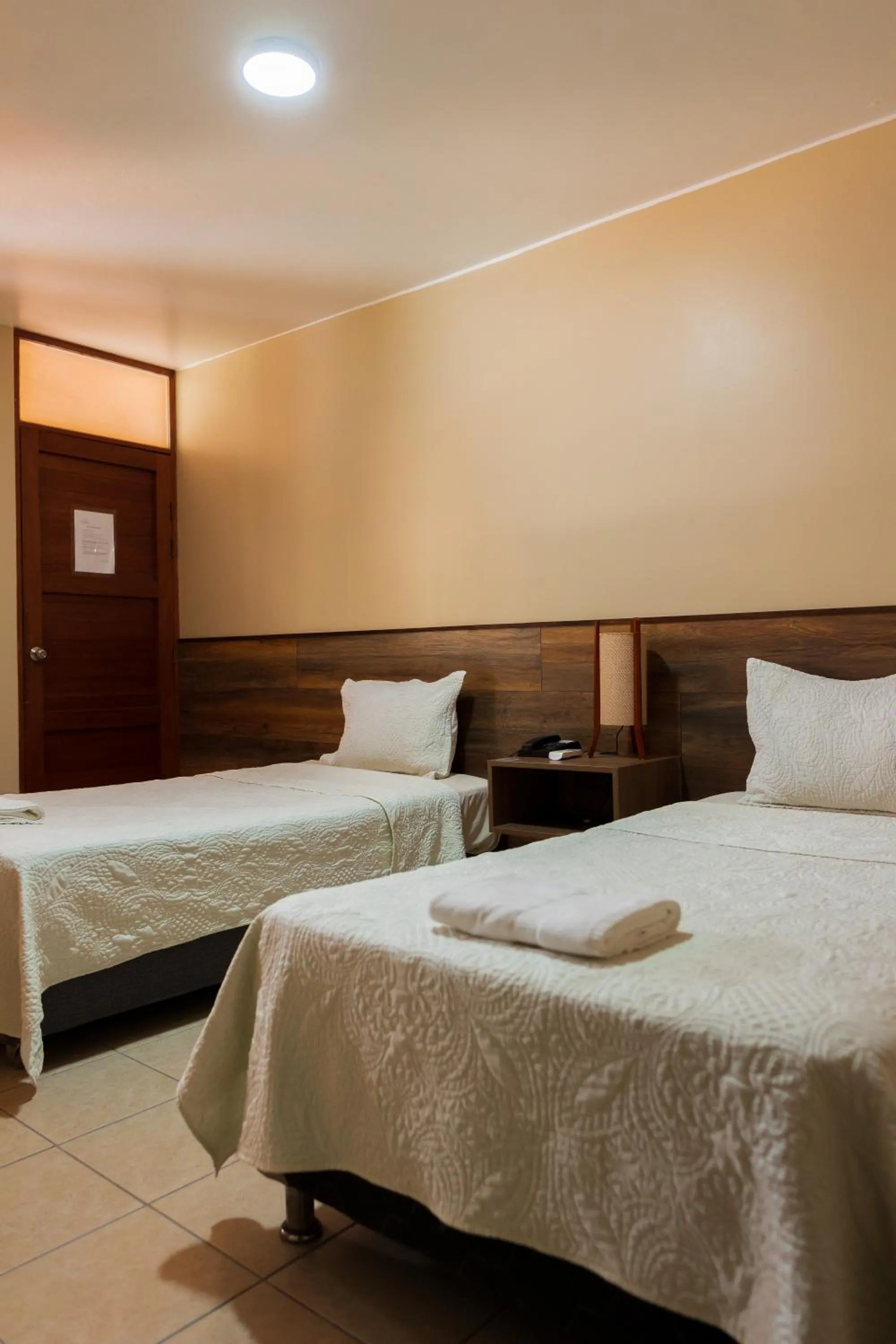 Bed in Hotel El Huacachinero- Hotel Familiar