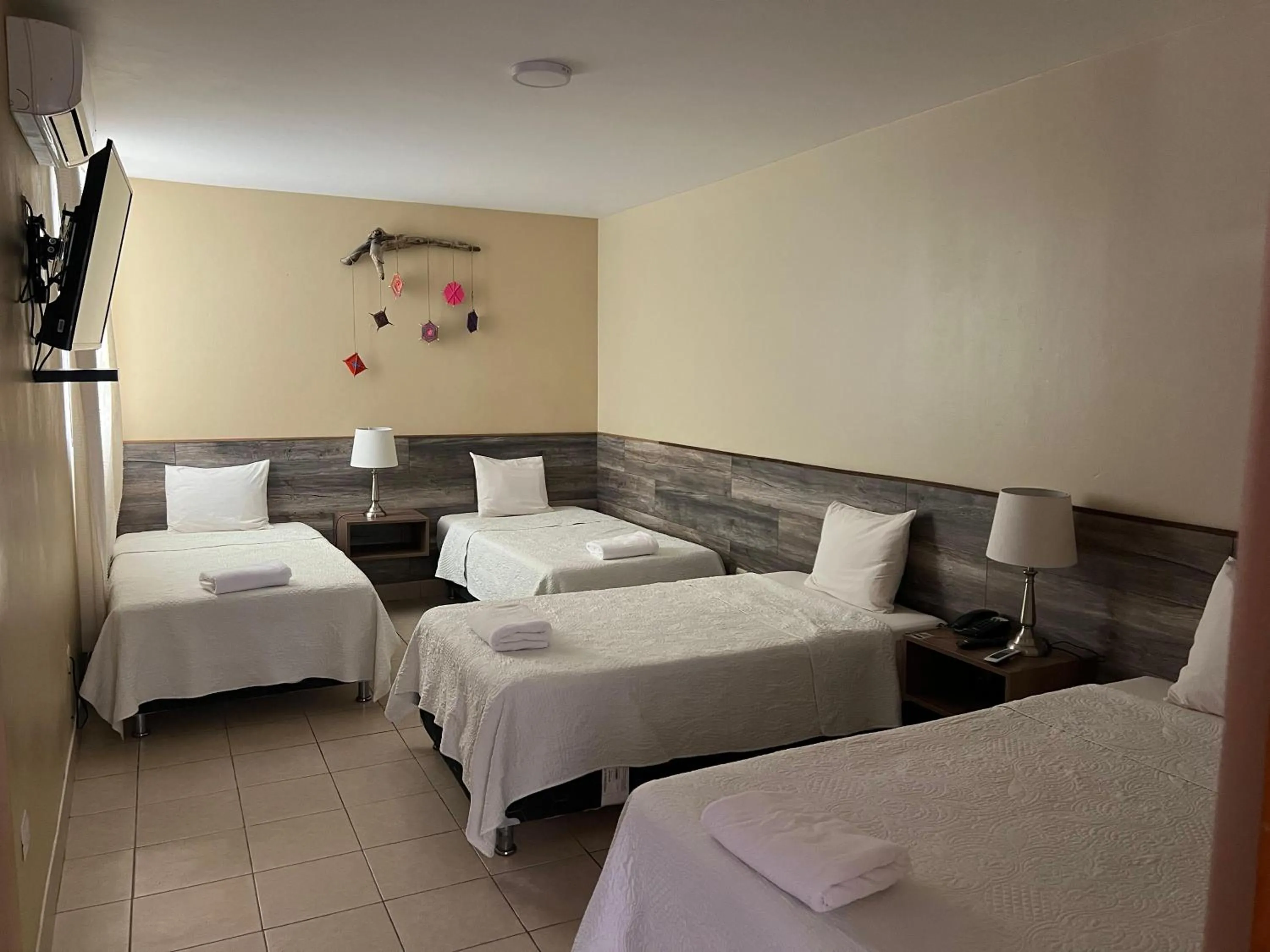 Bed in Hotel El Huacachinero- Hotel Familiar