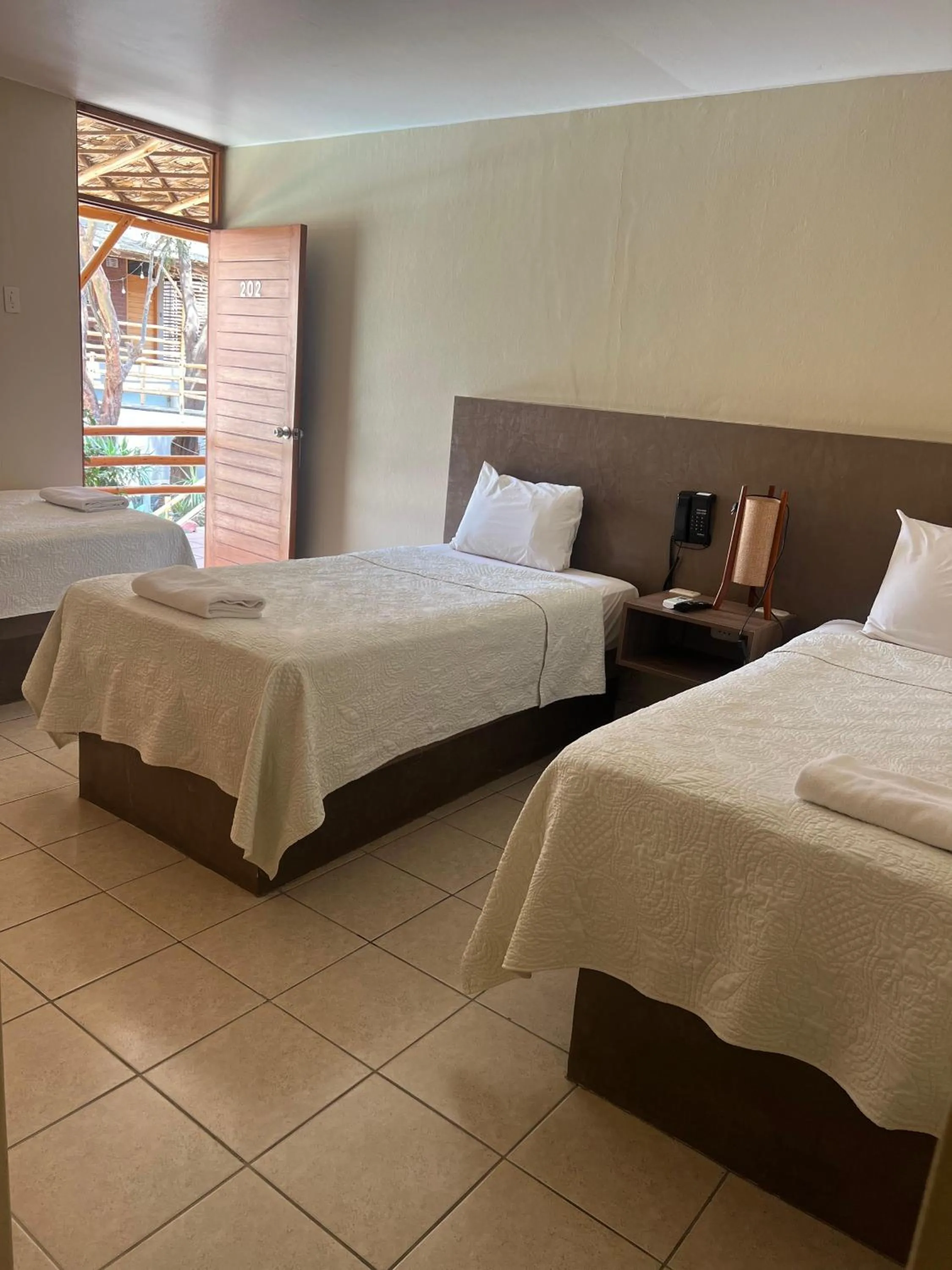 Bed in Hotel El Huacachinero- Hotel Familiar