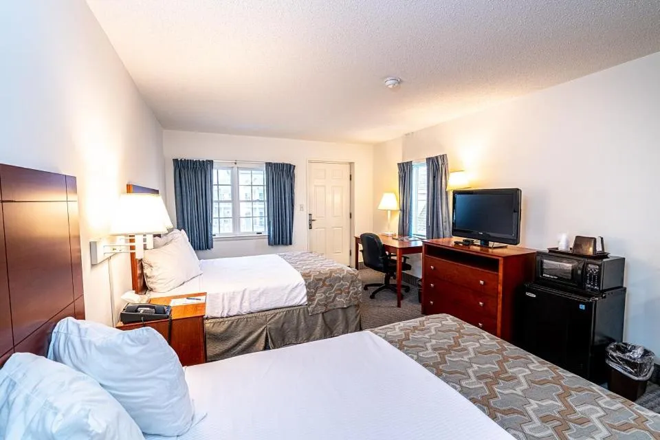 Bed in Anchorage Motel Inc.