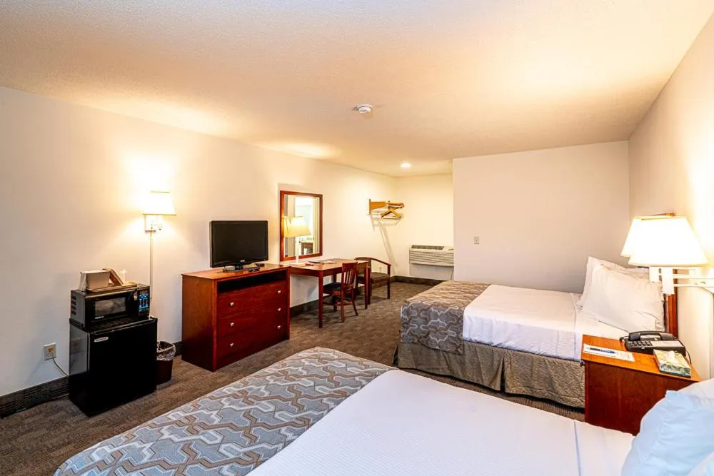 Bed in Anchorage Motel Inc.