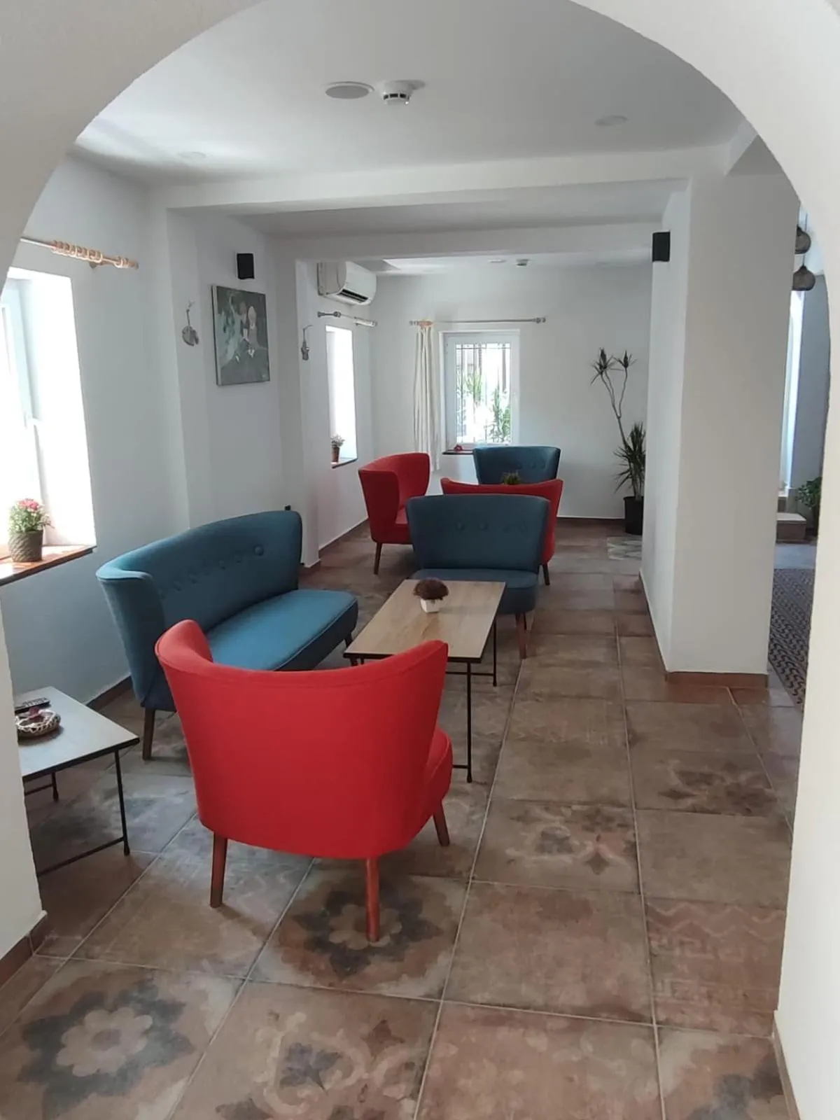 Communal lounge/ TV room in The Professor's Hotel