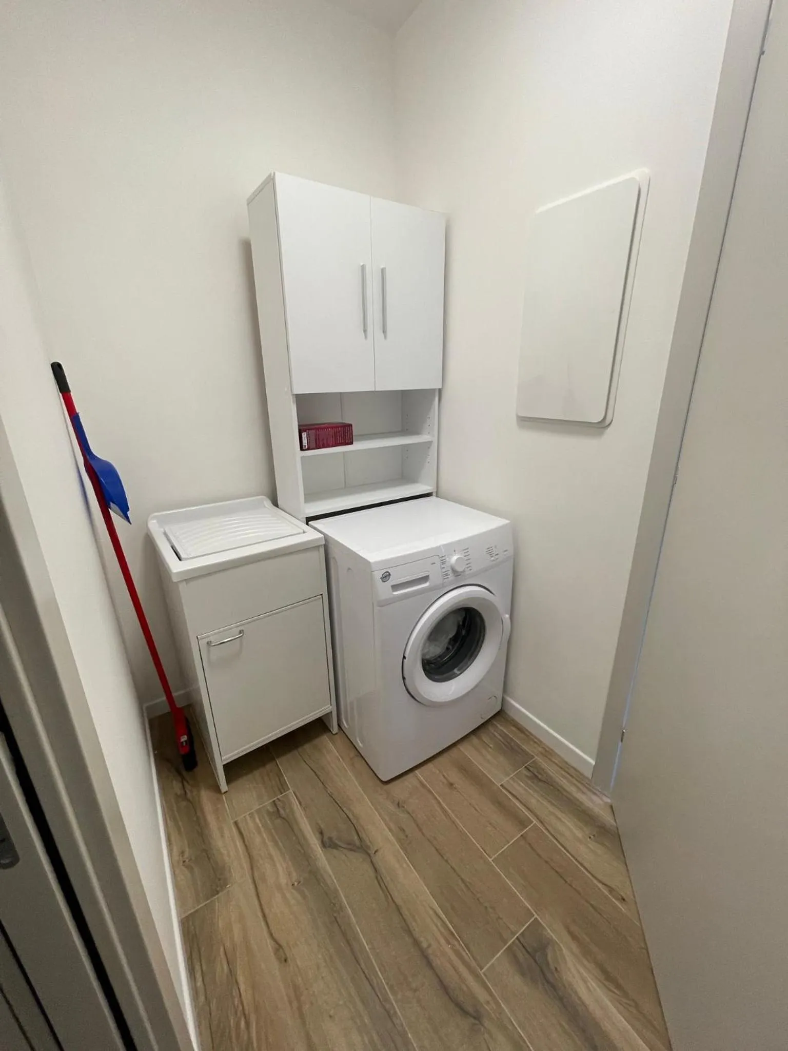 washing machine in SnowLake Suite & Apartment