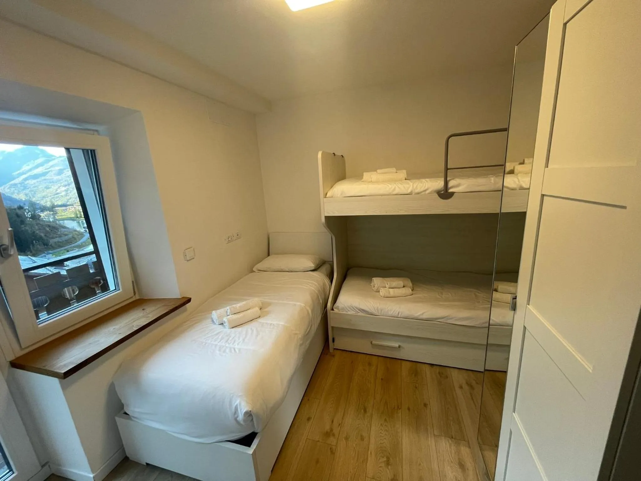 Bed in SnowLake Suite & Apartment