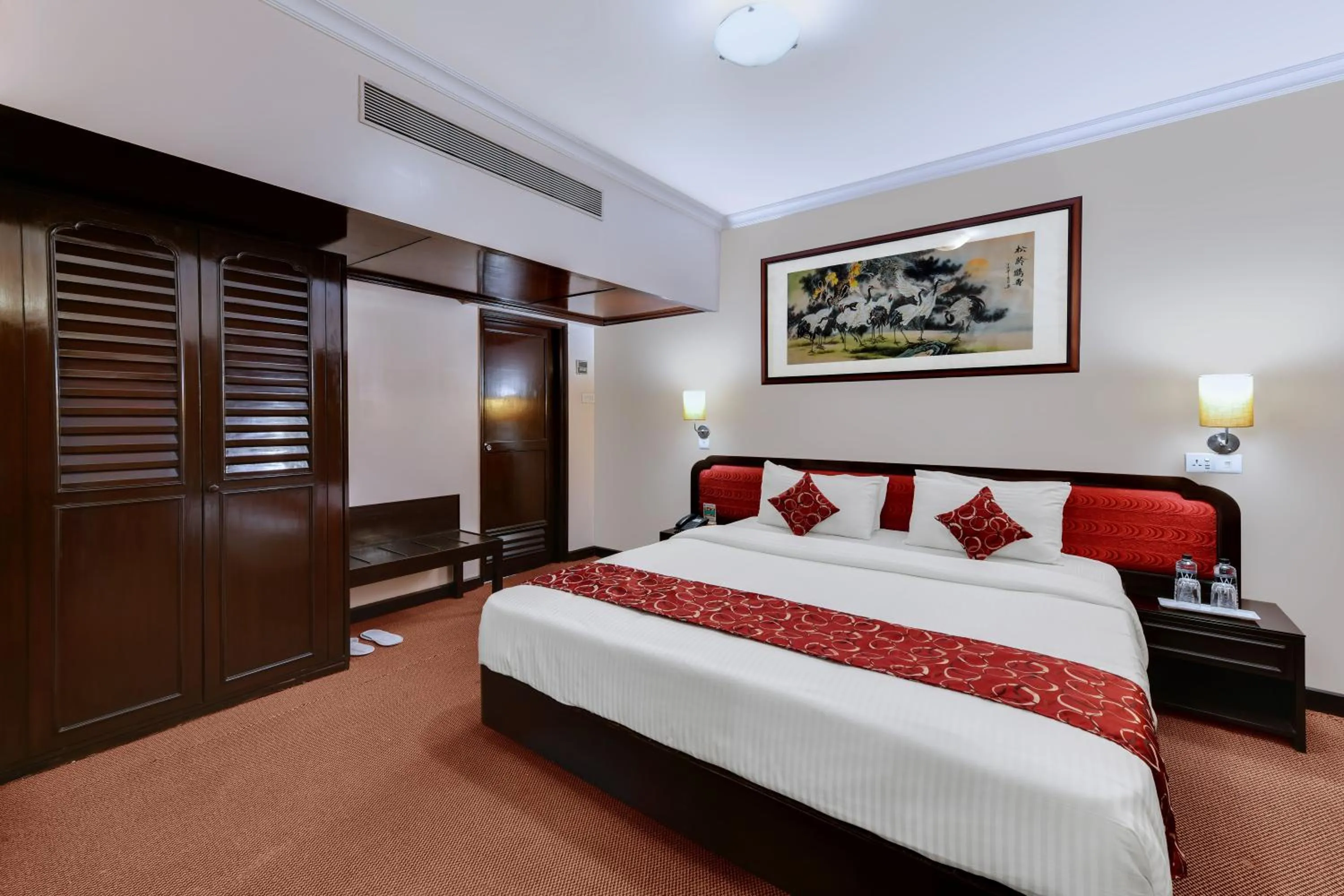 Bed in Quality Inn Regency, Nashik