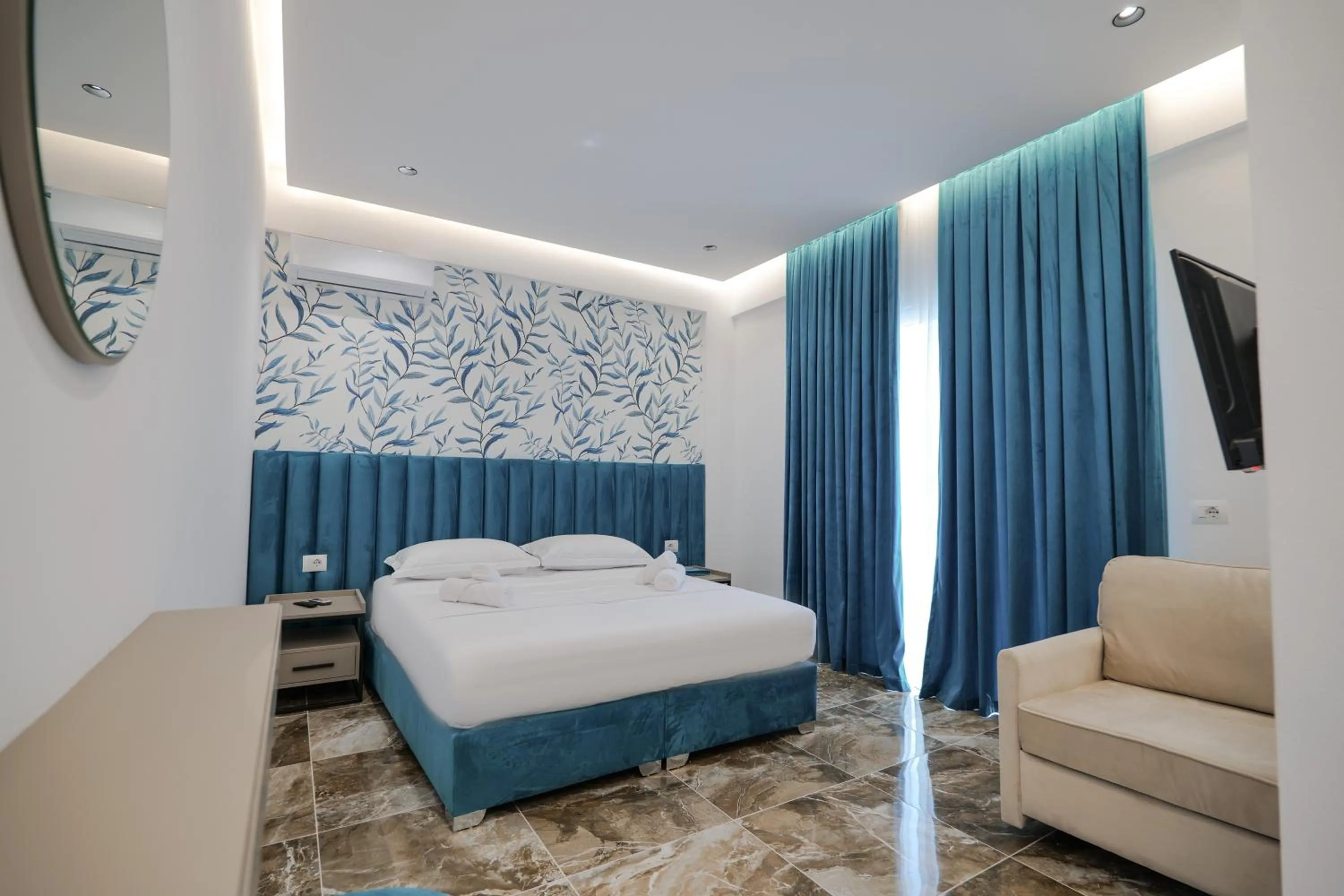 Bed in La Maison Boutique Hotel