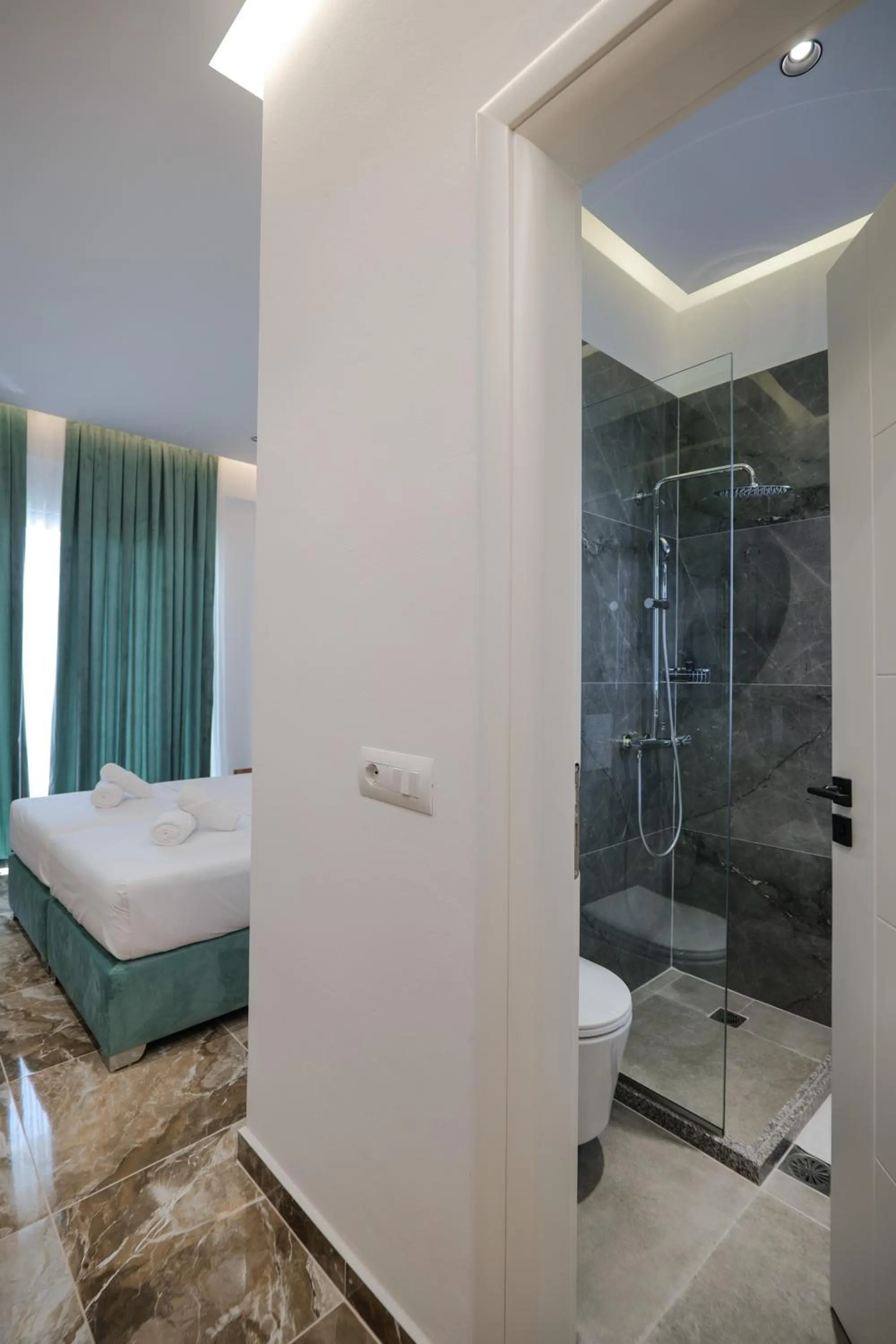 Bed in La Maison Boutique Hotel