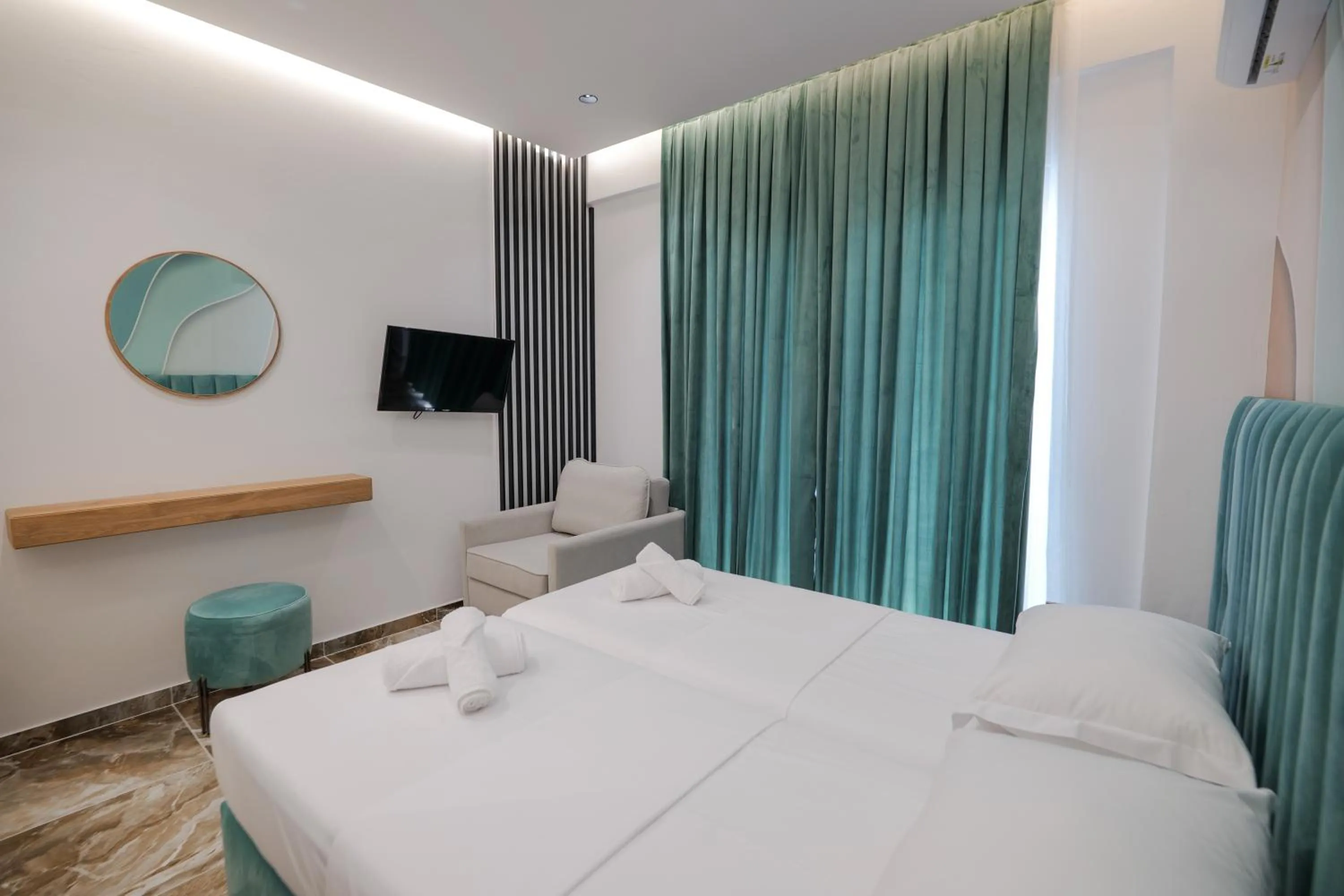 Bed in La Maison Boutique Hotel