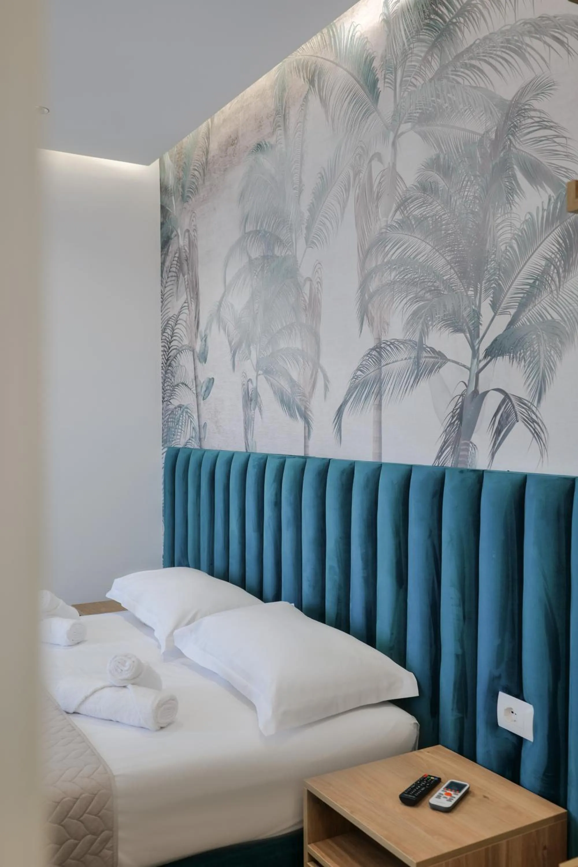 Bed in La Maison Boutique Hotel