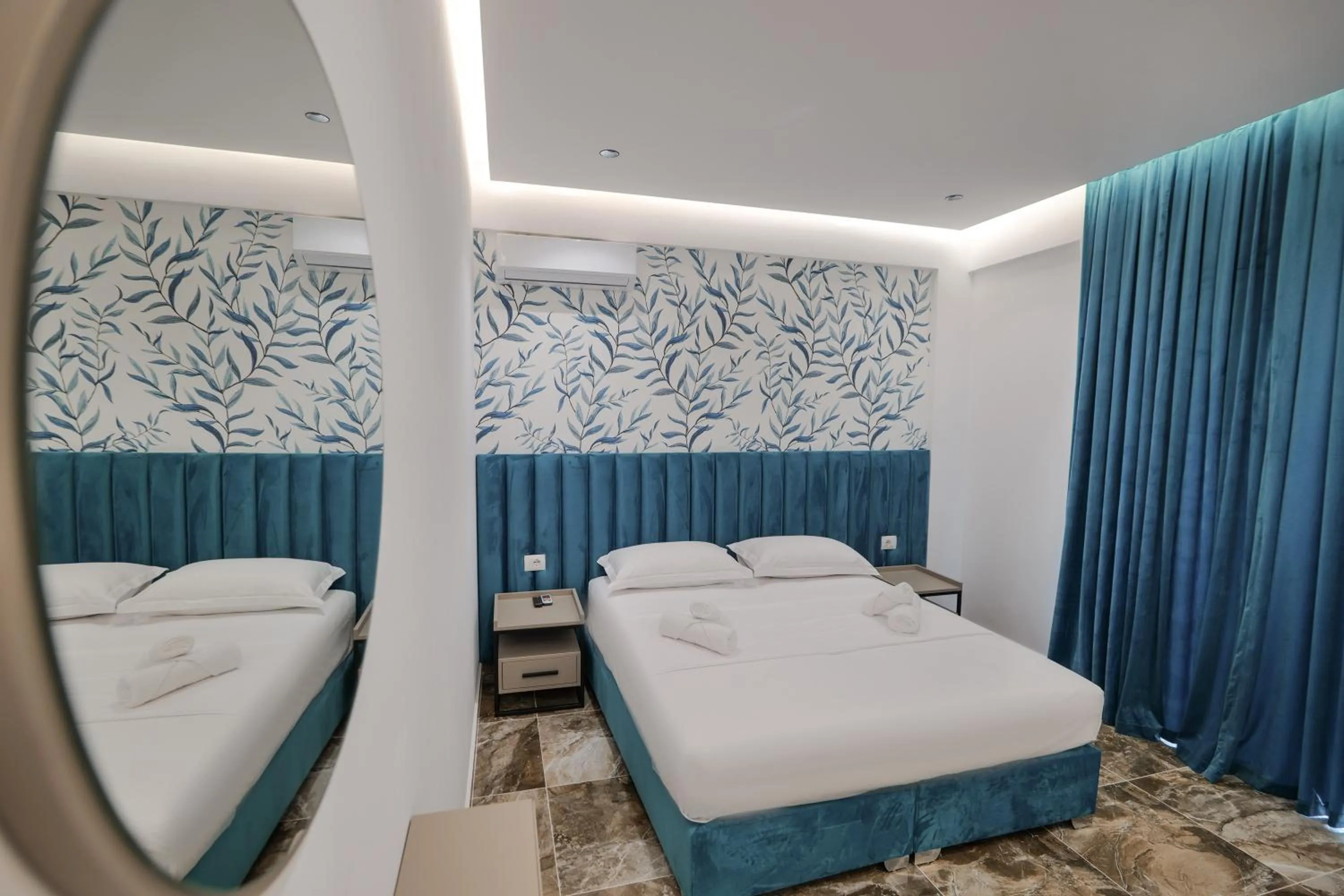 Bed in La Maison Boutique Hotel