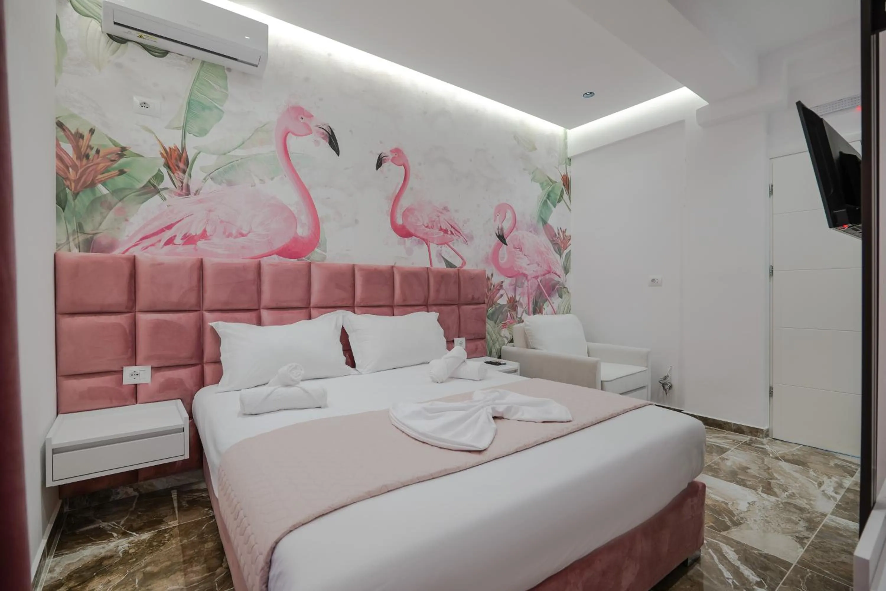 Bed in La Maison Boutique Hotel