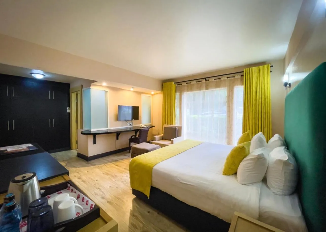 Bedroom in West Wood Hotel