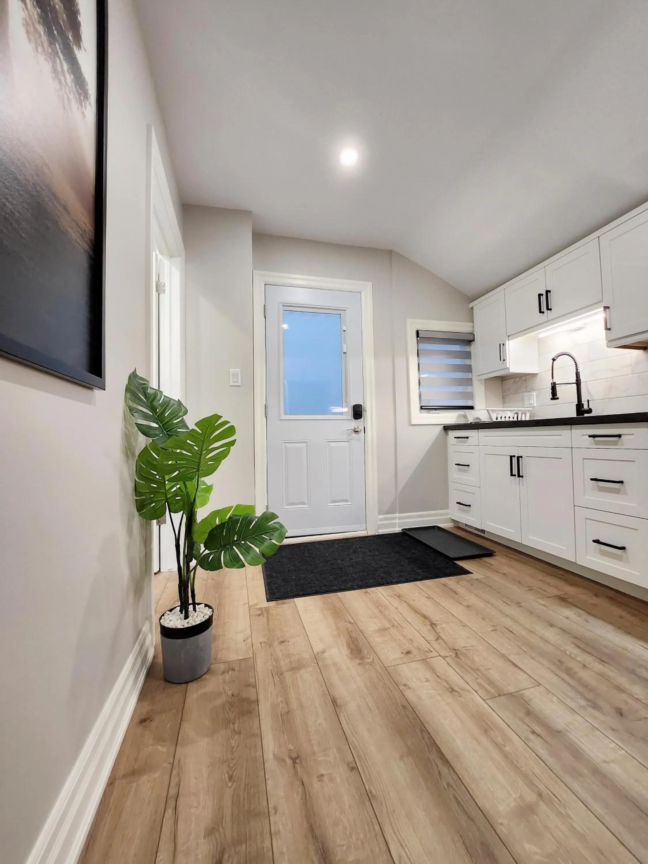 Kitchen or kitchenette in The Cozy Cove Modern King-Bedroom Full Apartment