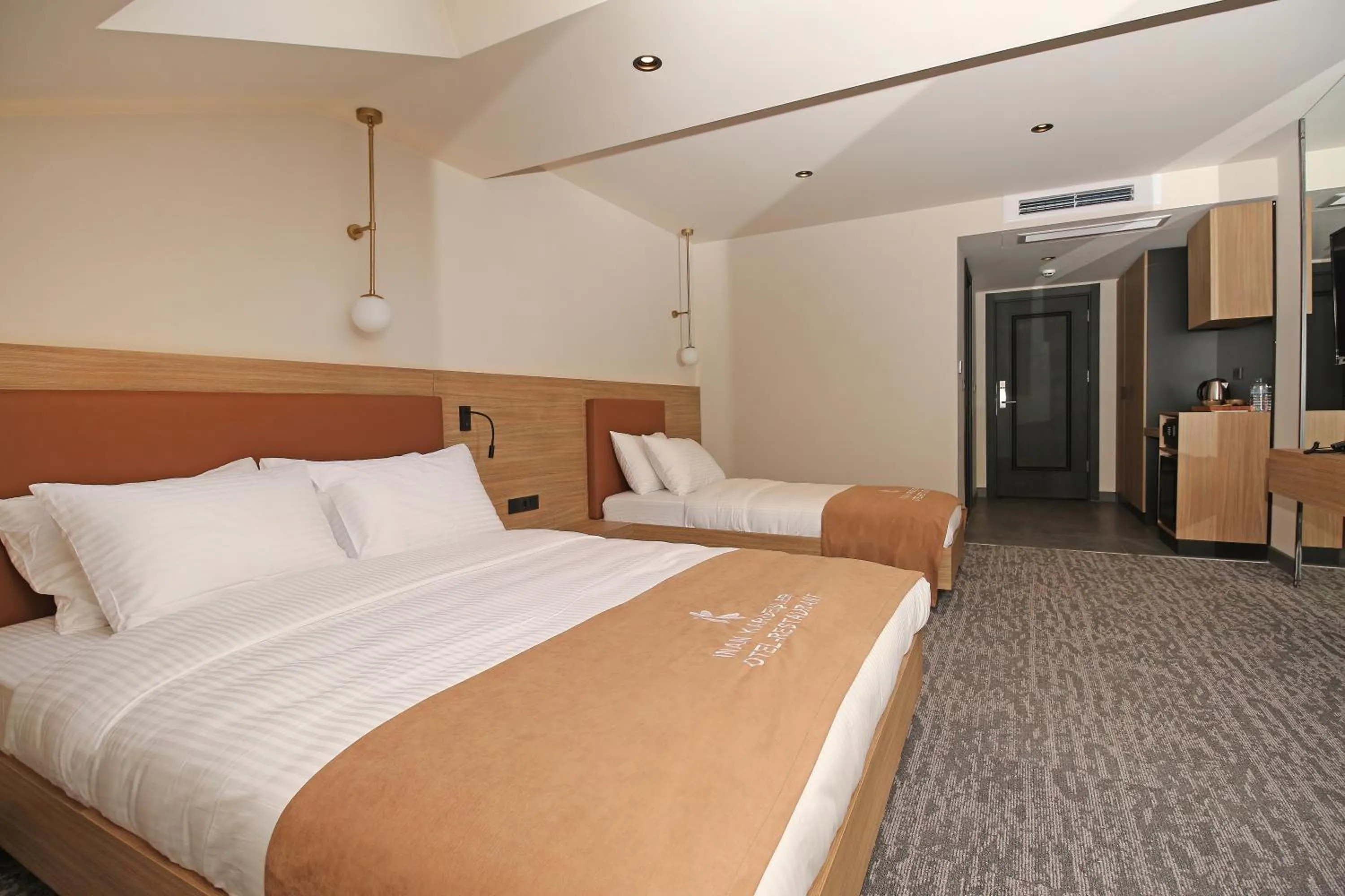 Bed in İnanlar City Hotel