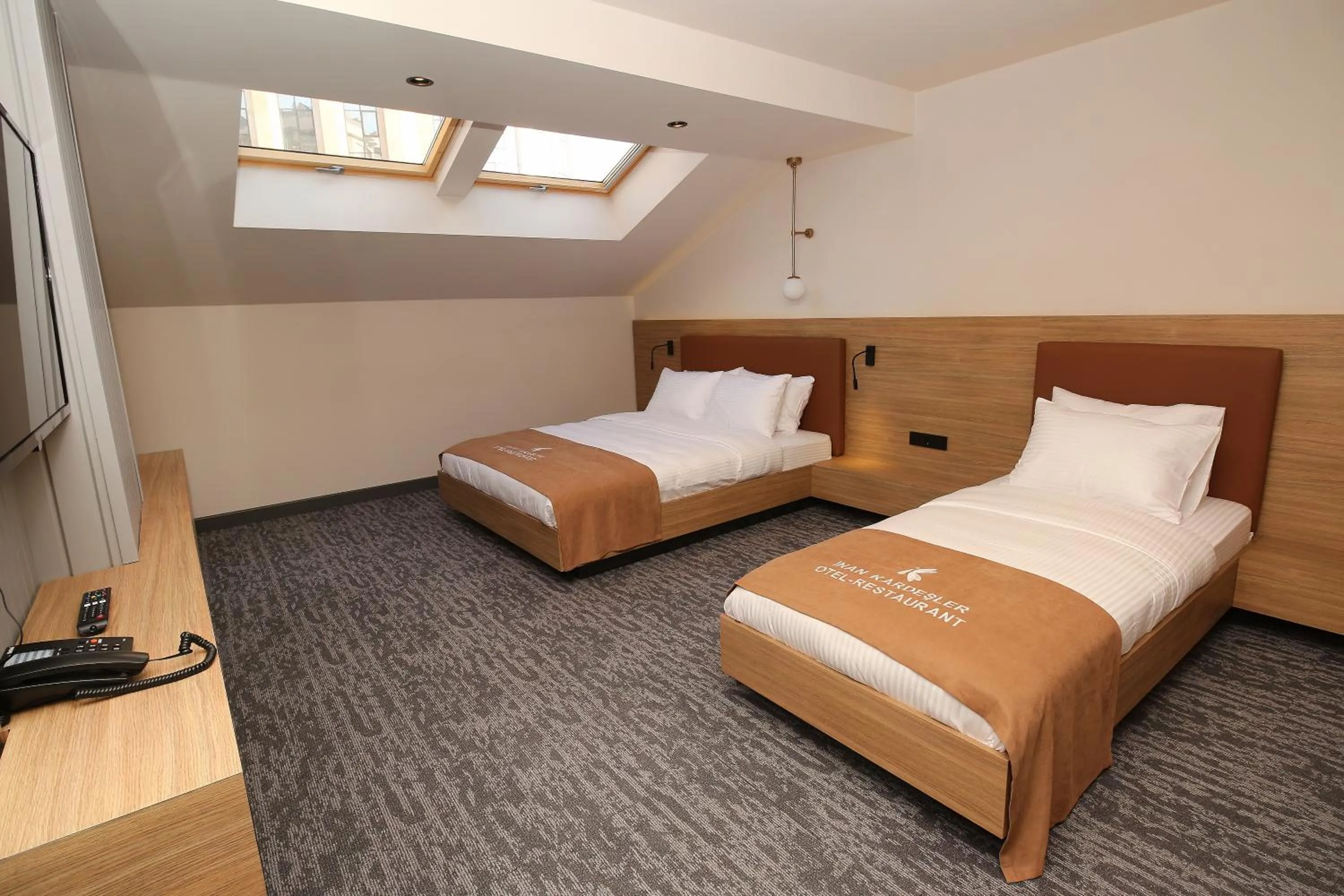 Bed in İnanlar City Hotel