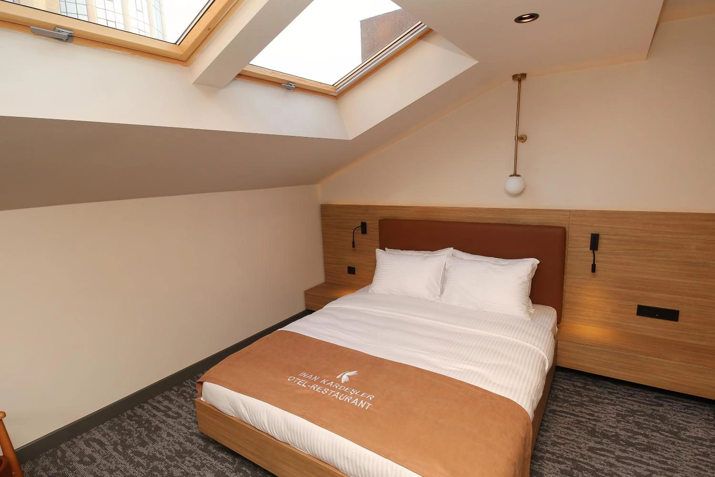 Bed in İnanlar City Hotel