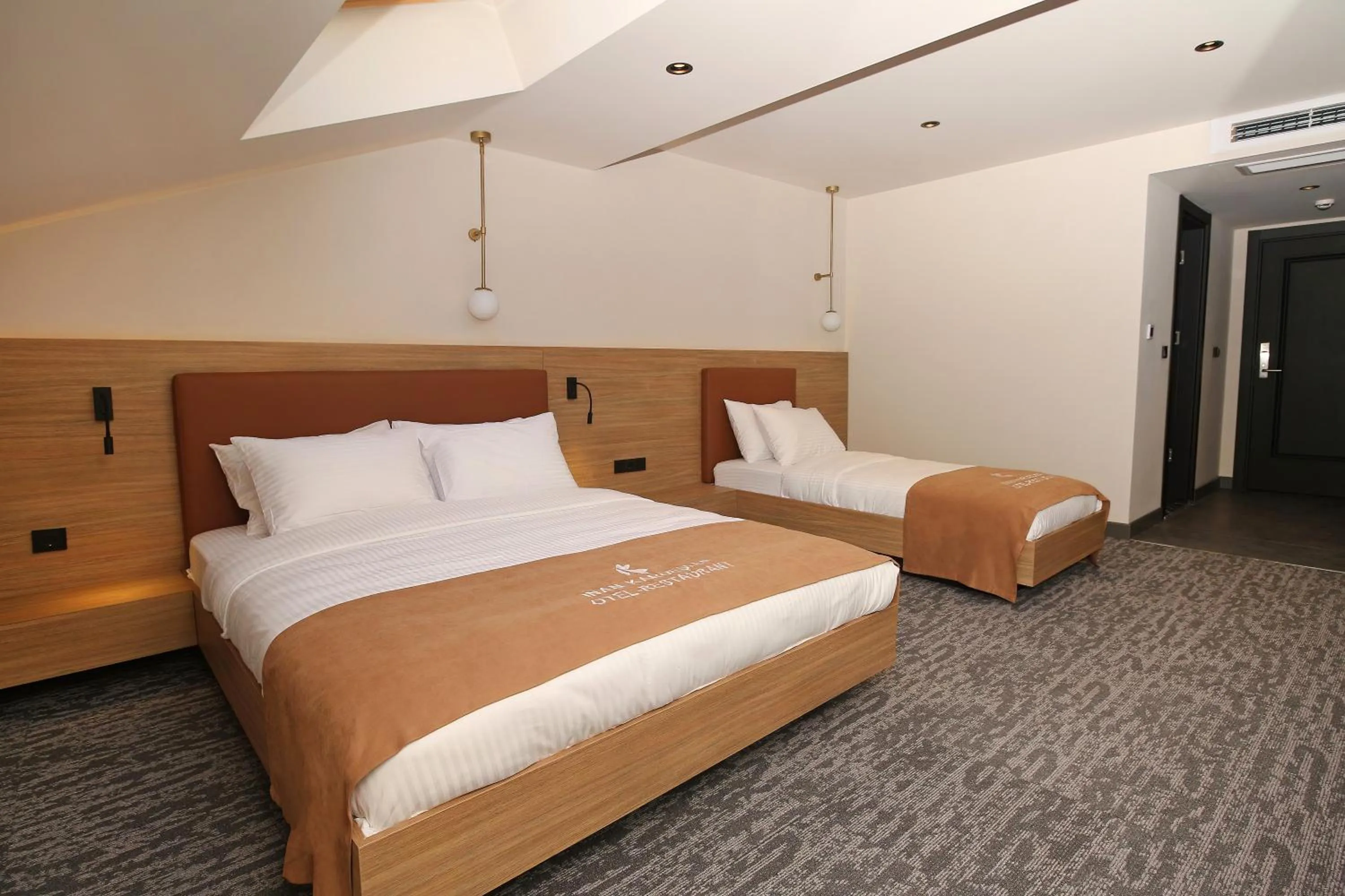 Bed in İnanlar City Hotel