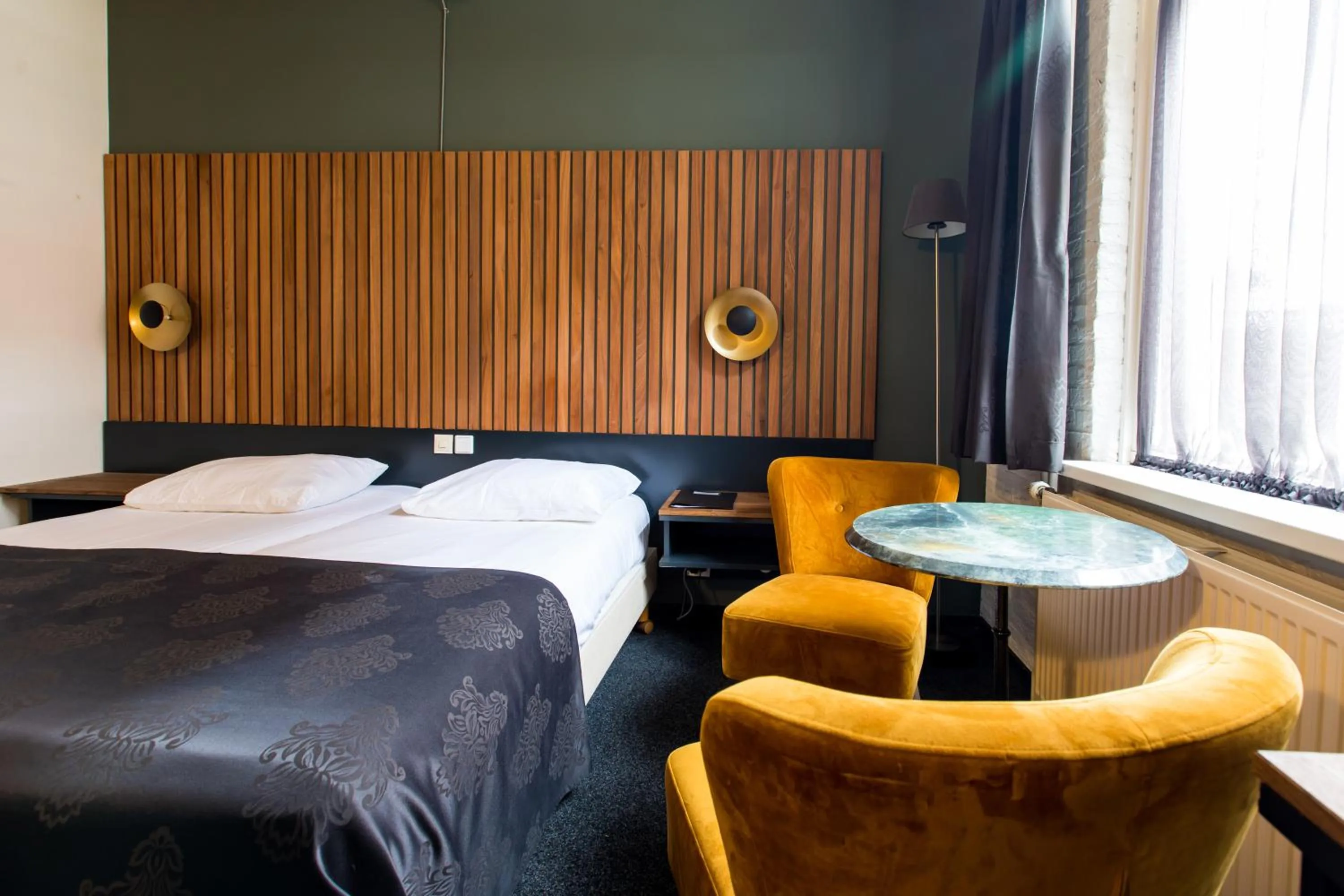 Bed in Hotel Café Restaurant De Posthoorn