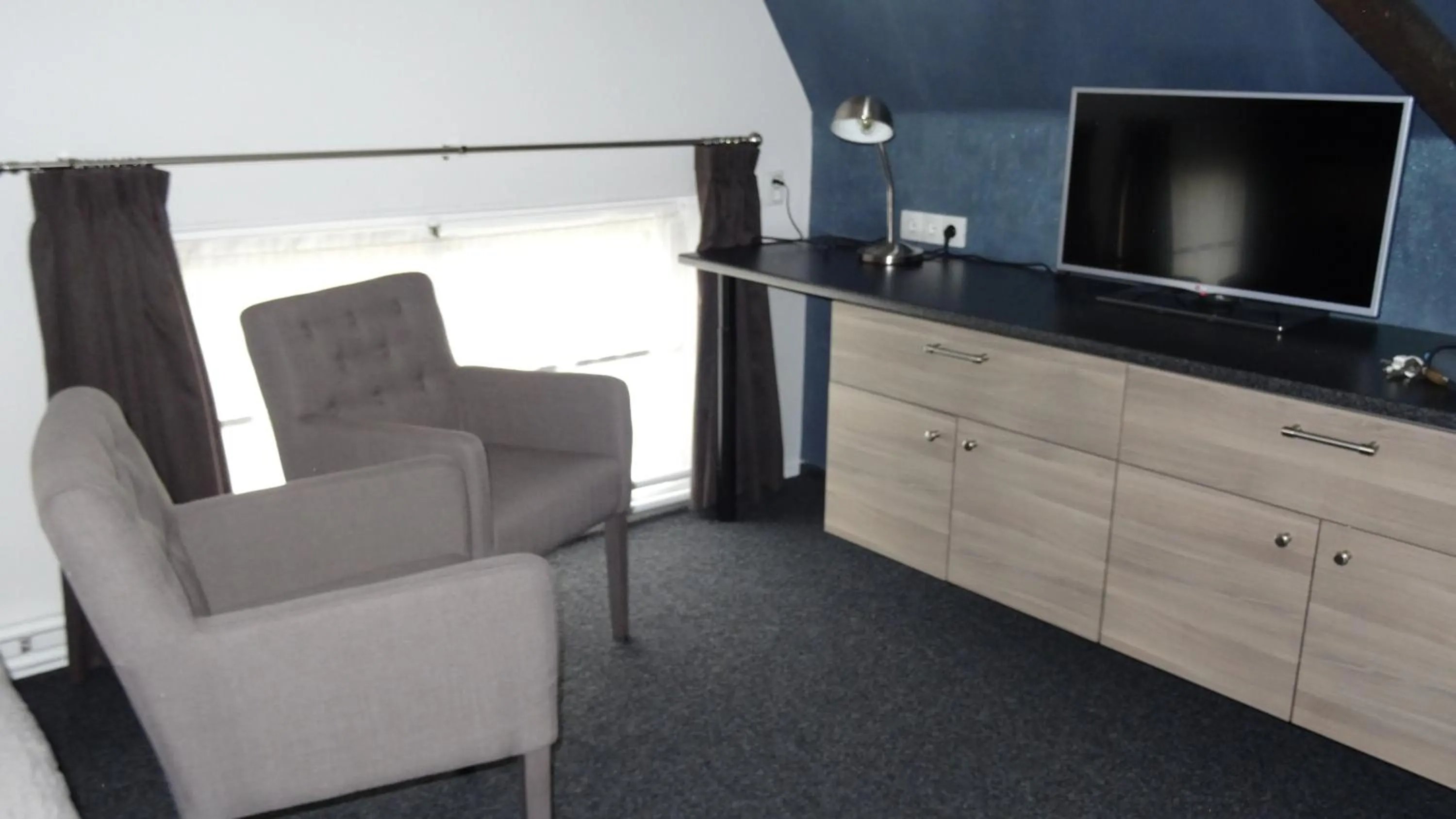 Bedroom in Hotel Café Restaurant De Posthoorn