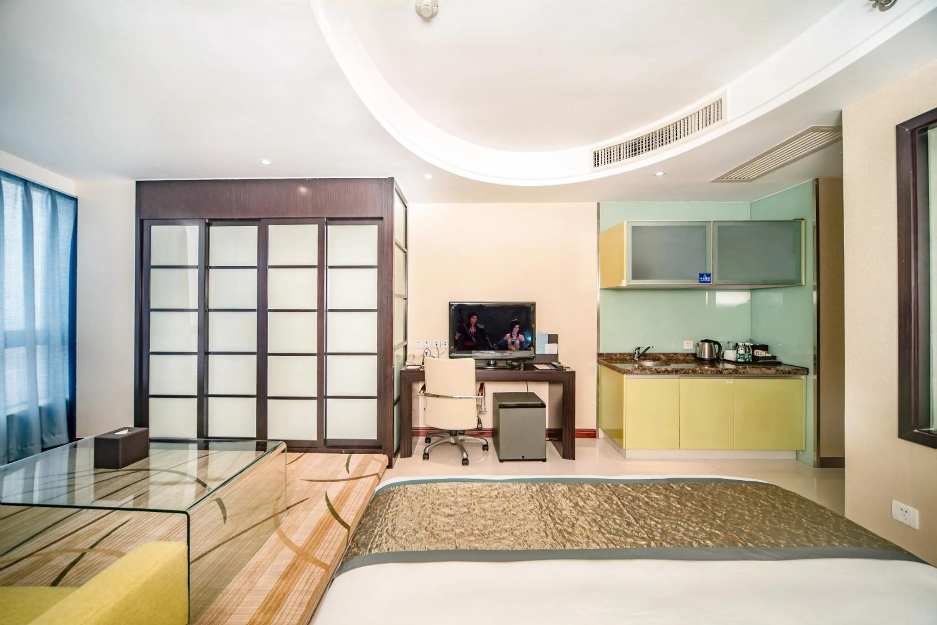 Photo of the whole room, Bed in Haikou Mingguang Shengyi Hotel (Previous Mingguang International Hotel)