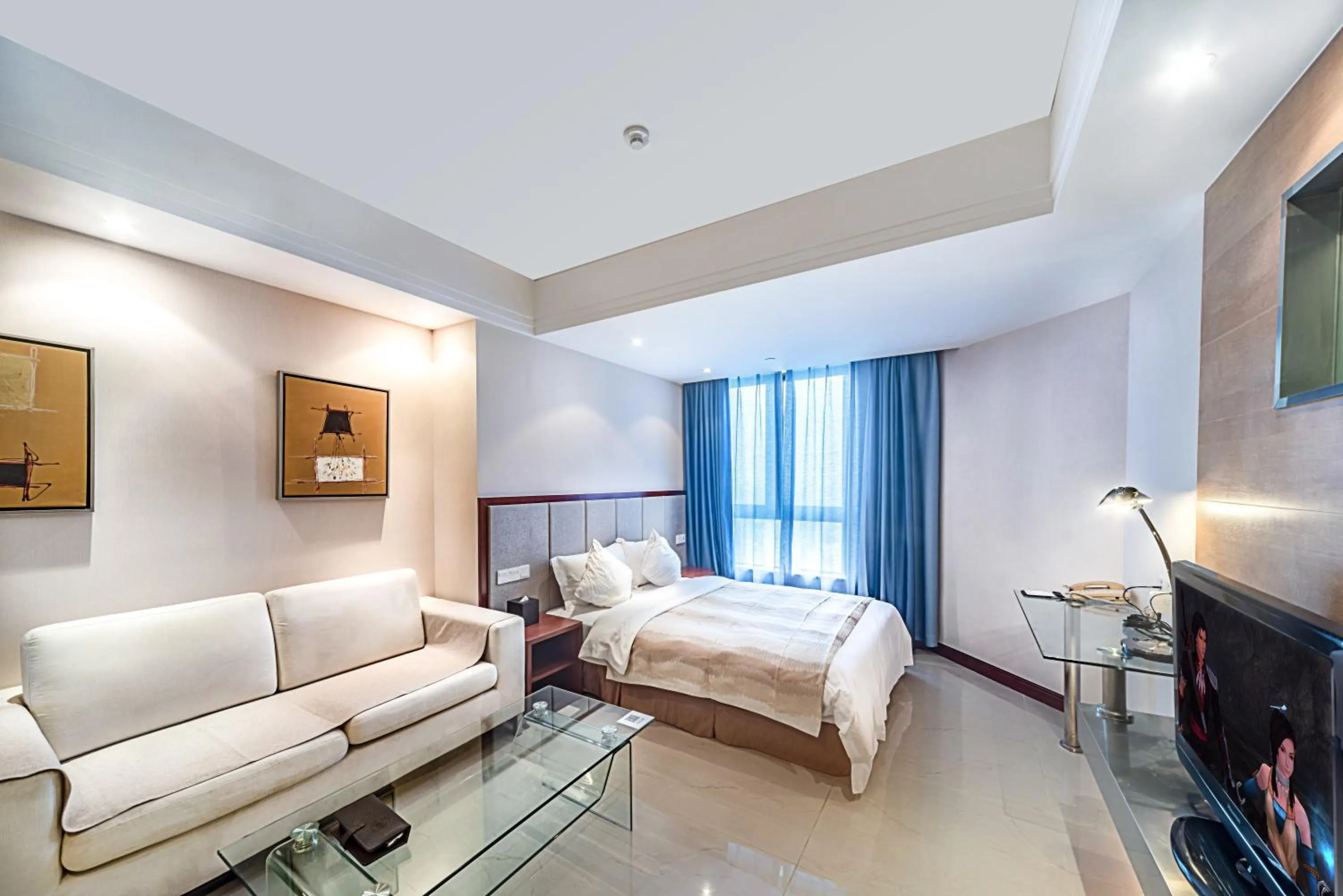 Photo of the whole room, Bed in Haikou Mingguang Shengyi Hotel (Previous Mingguang International Hotel)