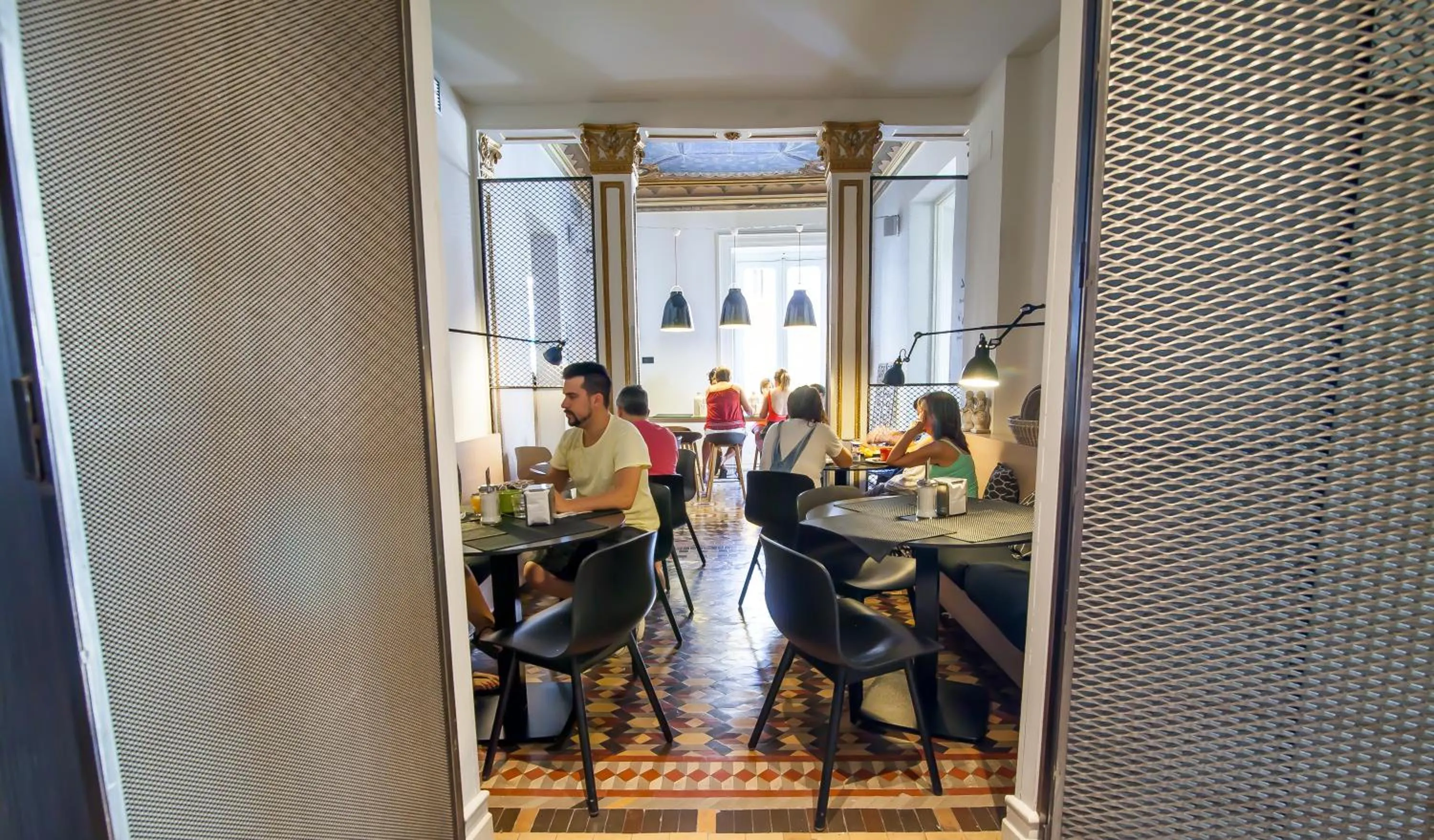 Communal lounge/ TV room in Toc Hostel Madrid