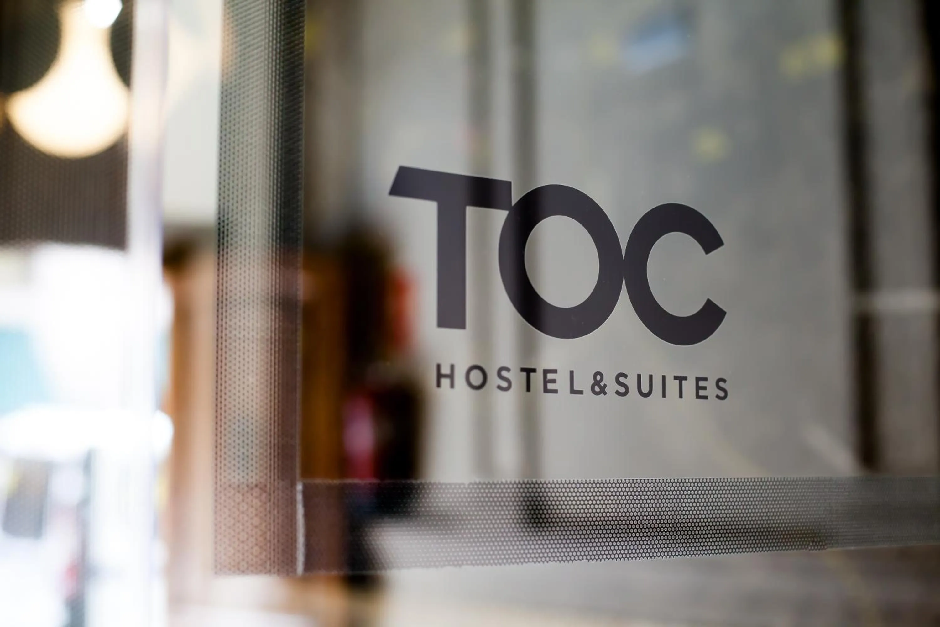 Text overlay in Toc Hostel Madrid