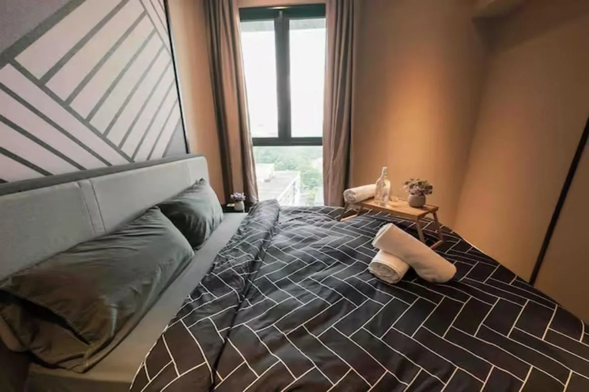 Bed in Millerz Cozy Home by GUESTONIC