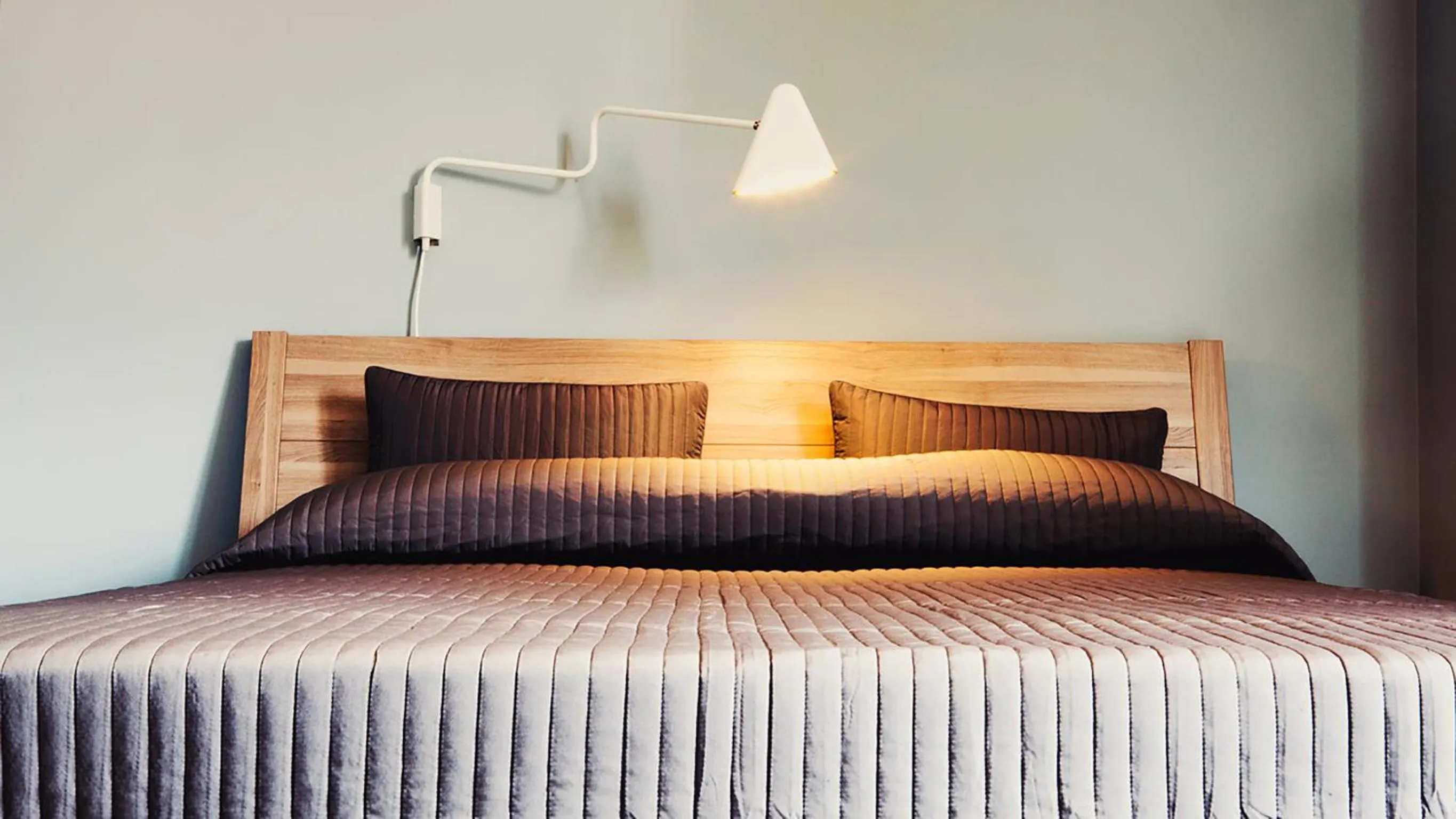 Bed in La Scivola Rooms