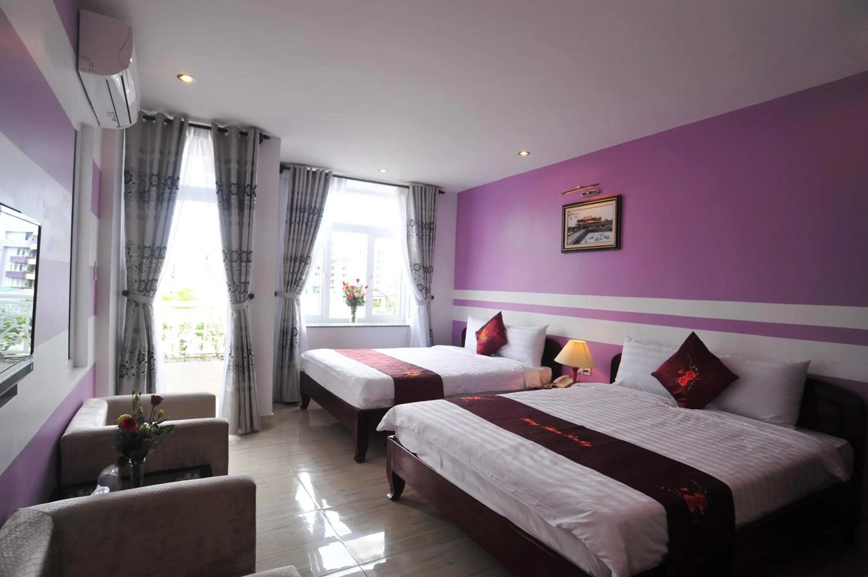 Photo of the whole room, Bed in Hong Thien Ruby Hotel