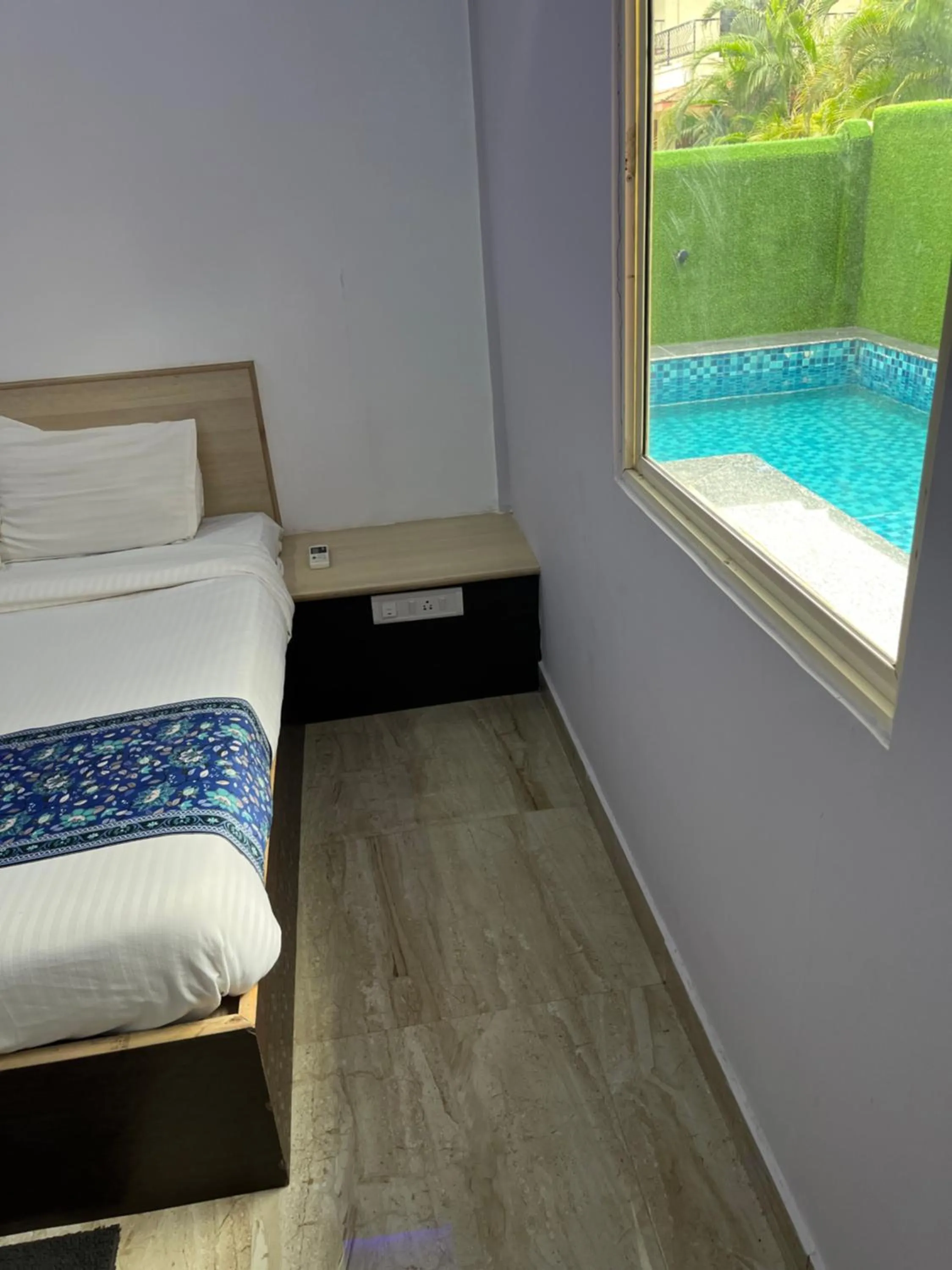 Bed, Pool View in The Terra Hotel North Goa