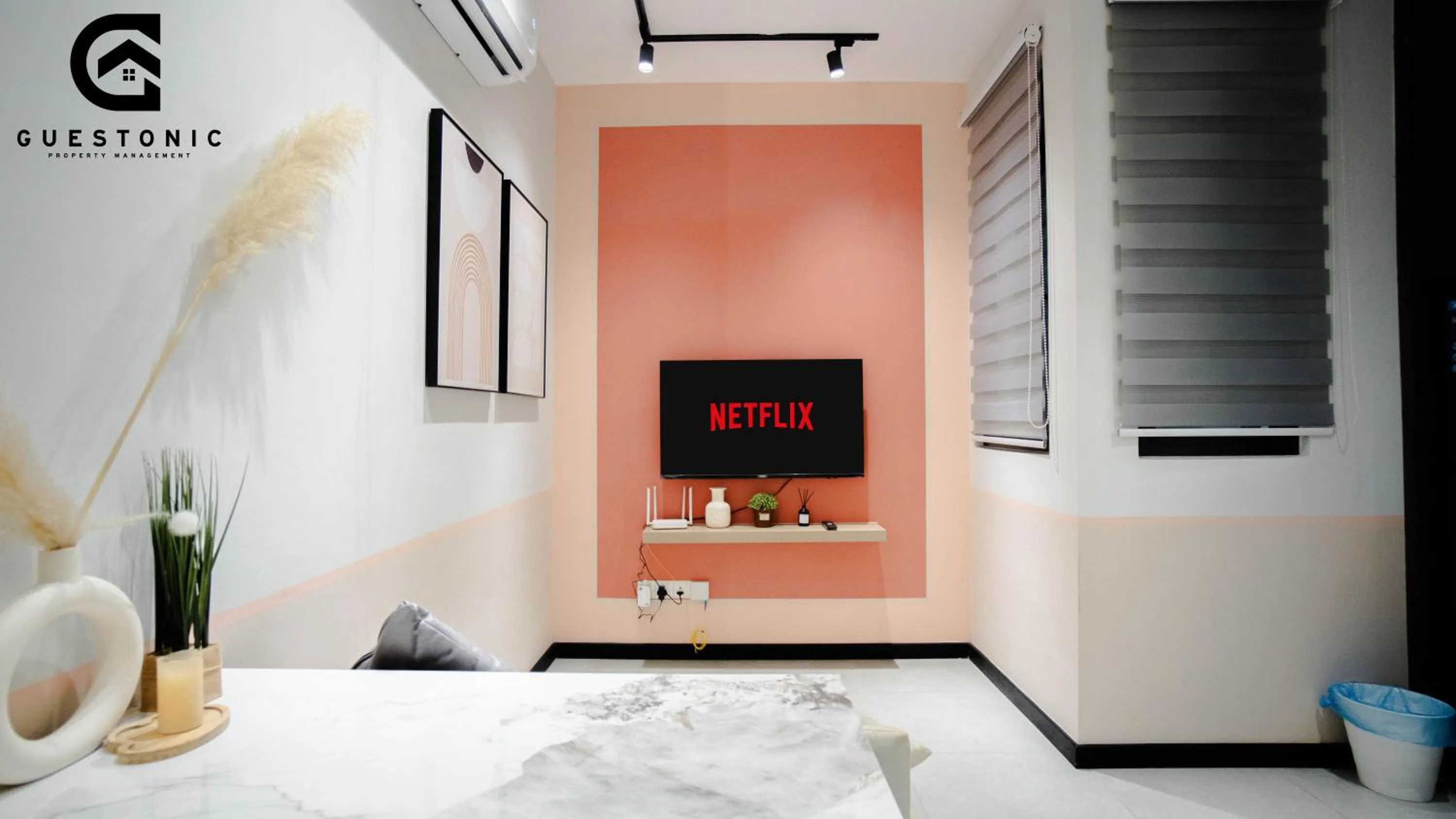 Bed in NeuSuite Cozy Studio by GUESTONIC