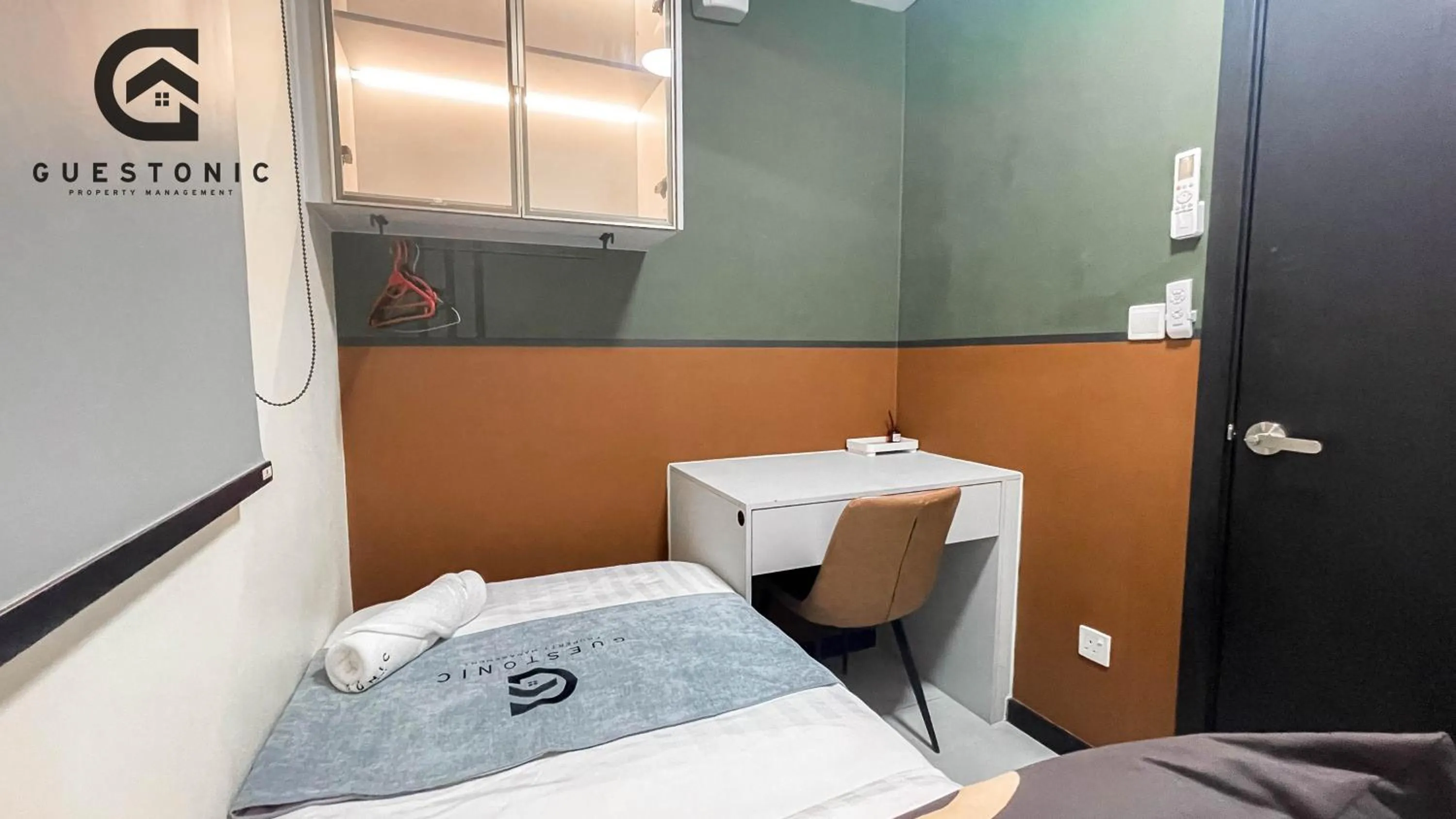 Bed in NeuSuite Cozy Studio by GUESTONIC