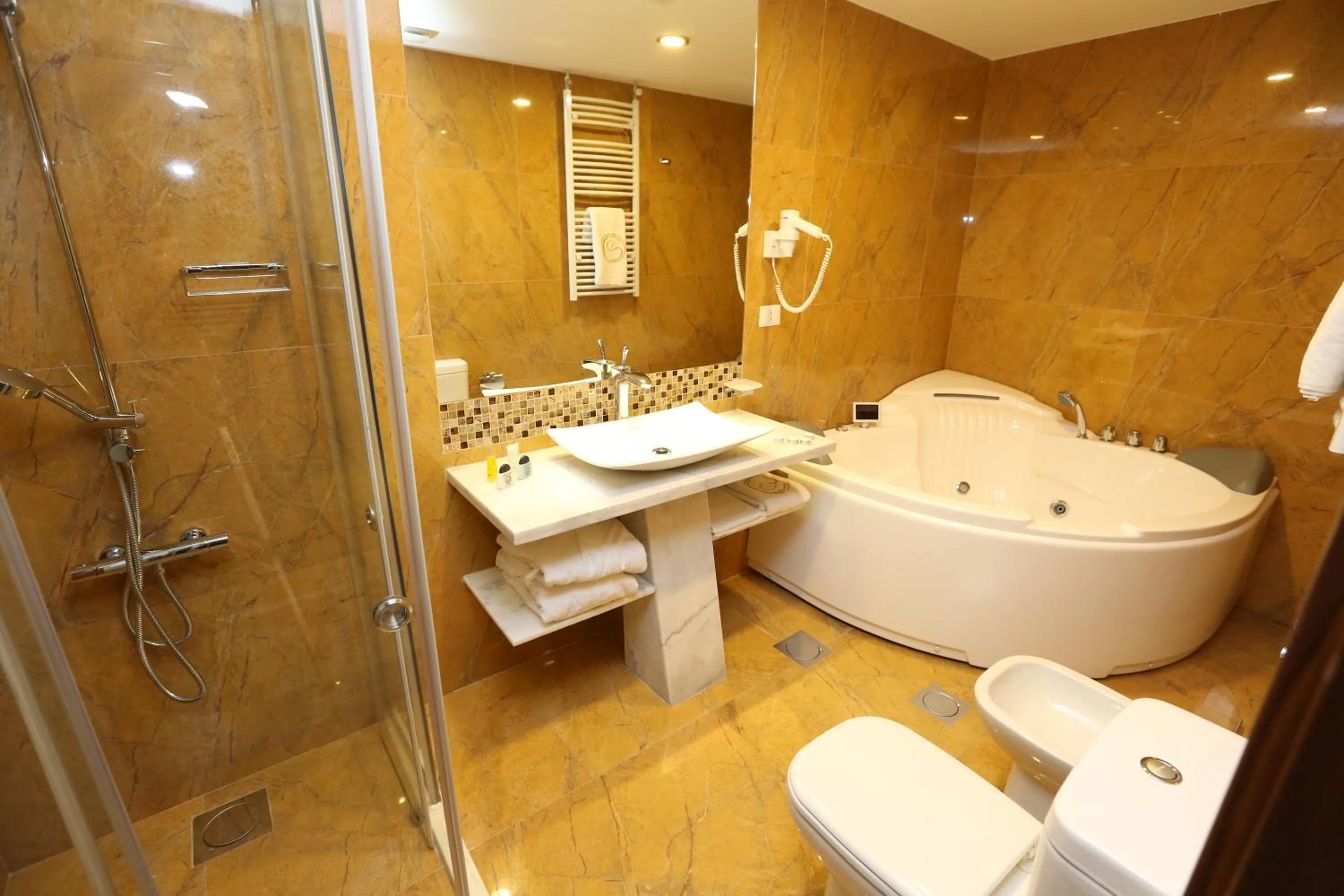 Bathroom in Delora Hotel and Suites