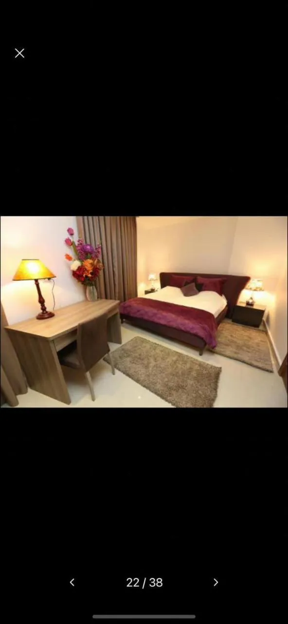 Bed in Delora Hotel and Suites