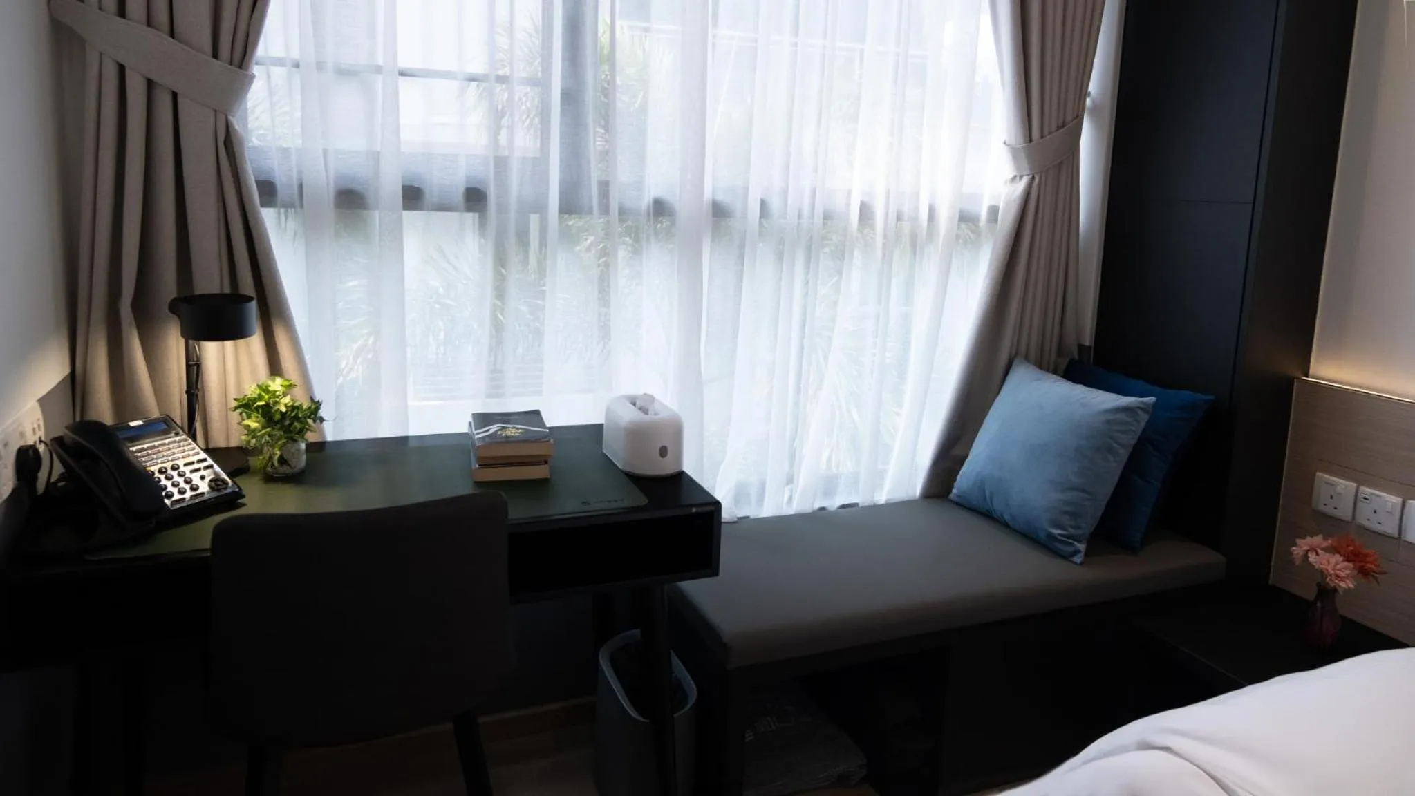 Seating area, Bed in VicHaus Serviced Apartment