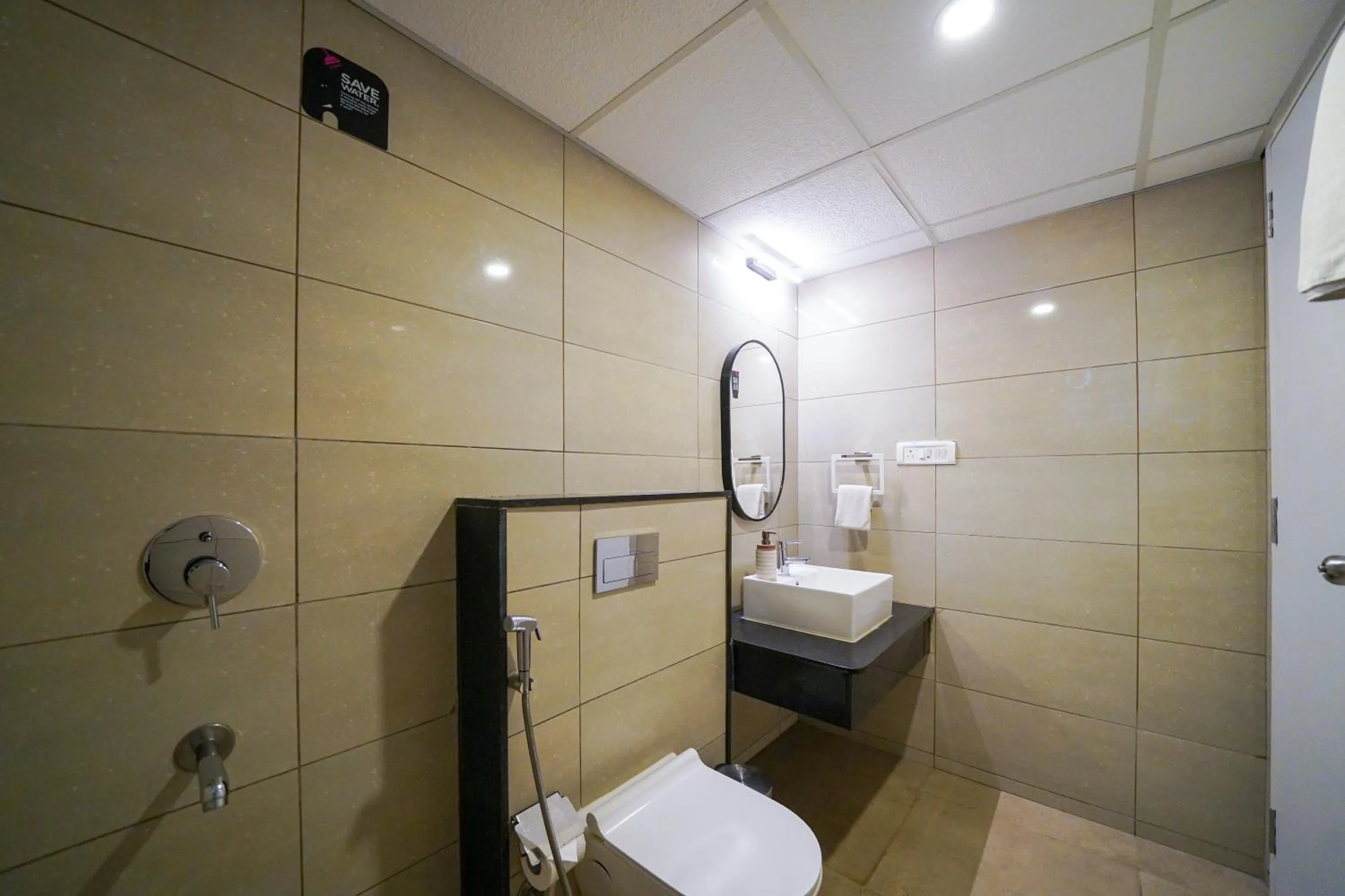 Toilet in Olive Hotel JP Nagar by Embassy Group