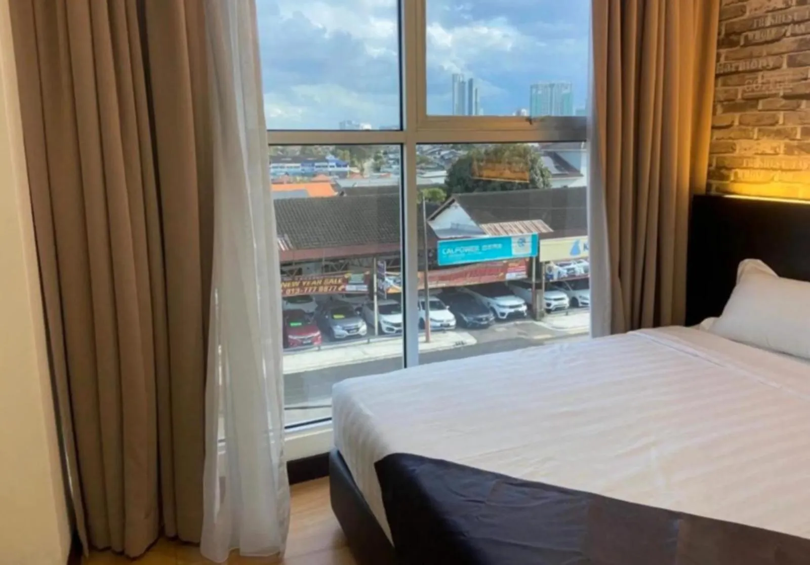 Bedroom in Hotel EzzyHome Kebun Teh