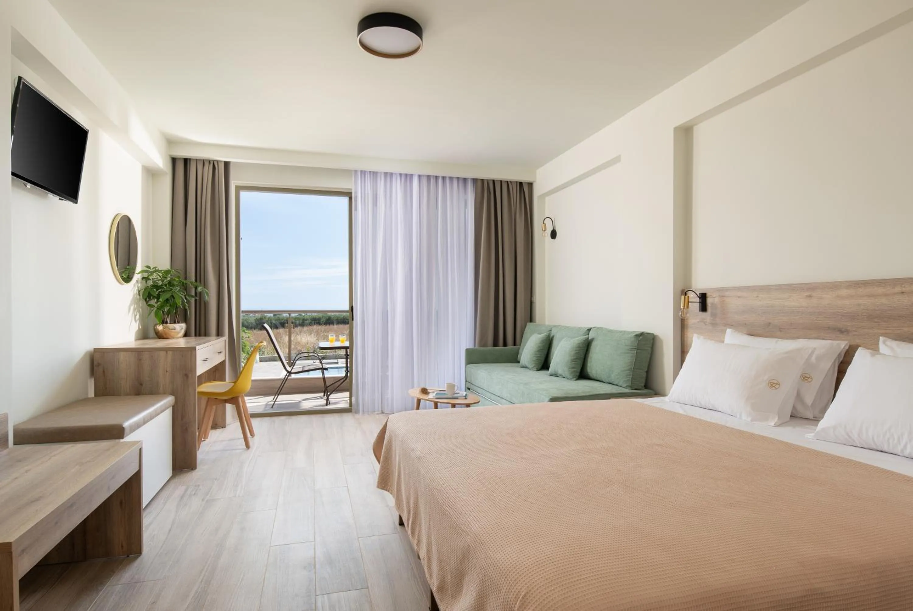 Bed in Aetherion Studios & Suites