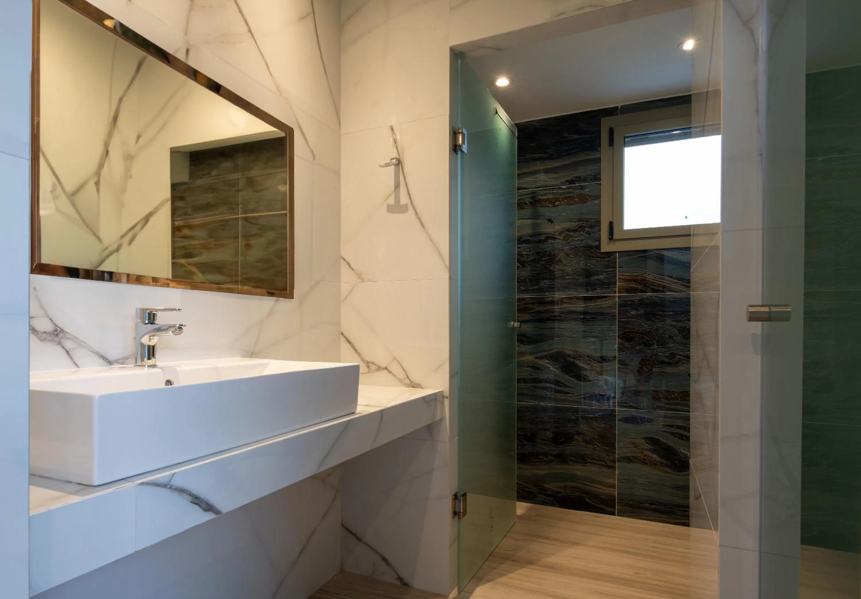 Bathroom in Aetherion Studios & Suites