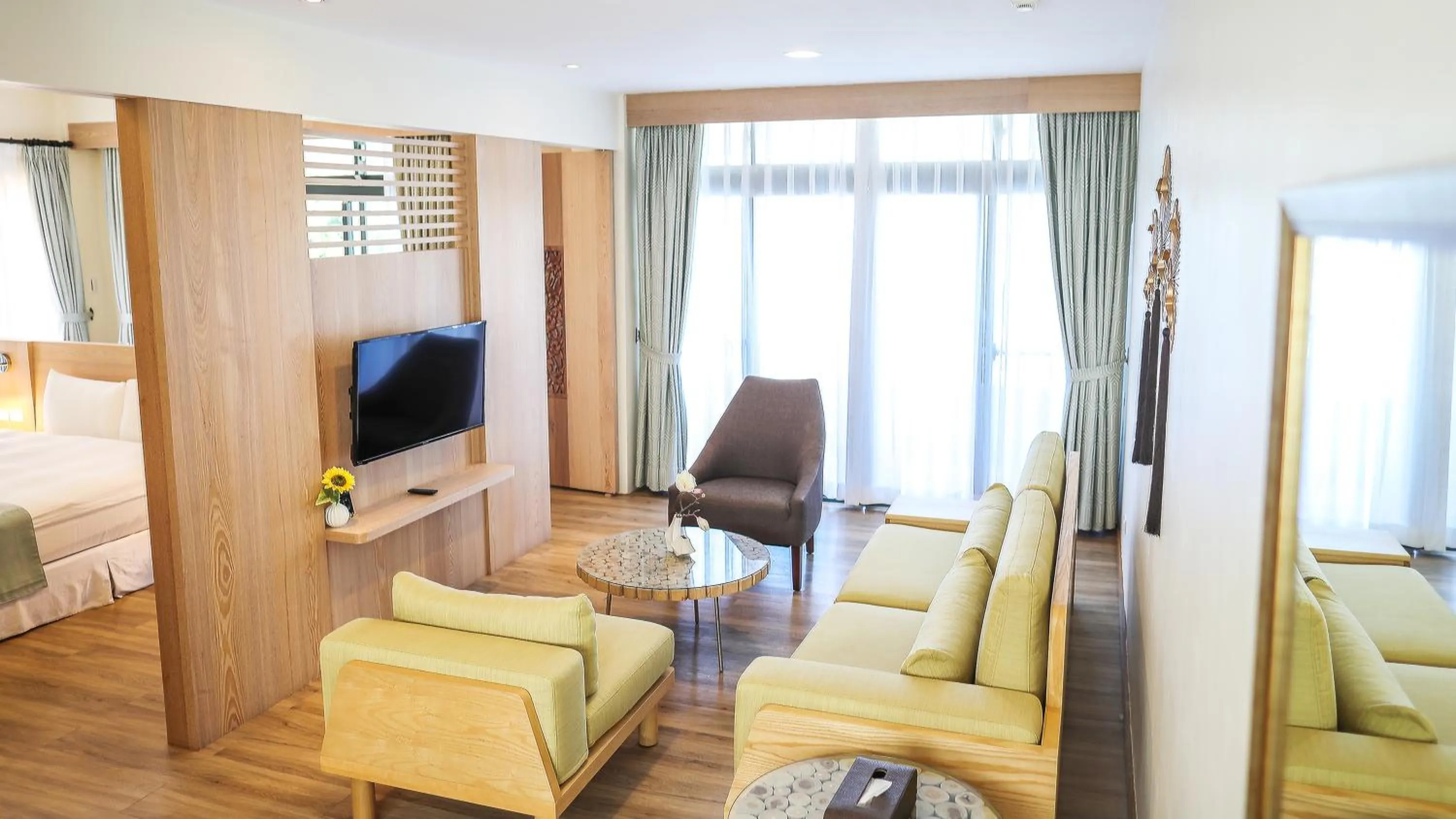 Communal lounge/ TV room, Bed in Sea Passion Hotel