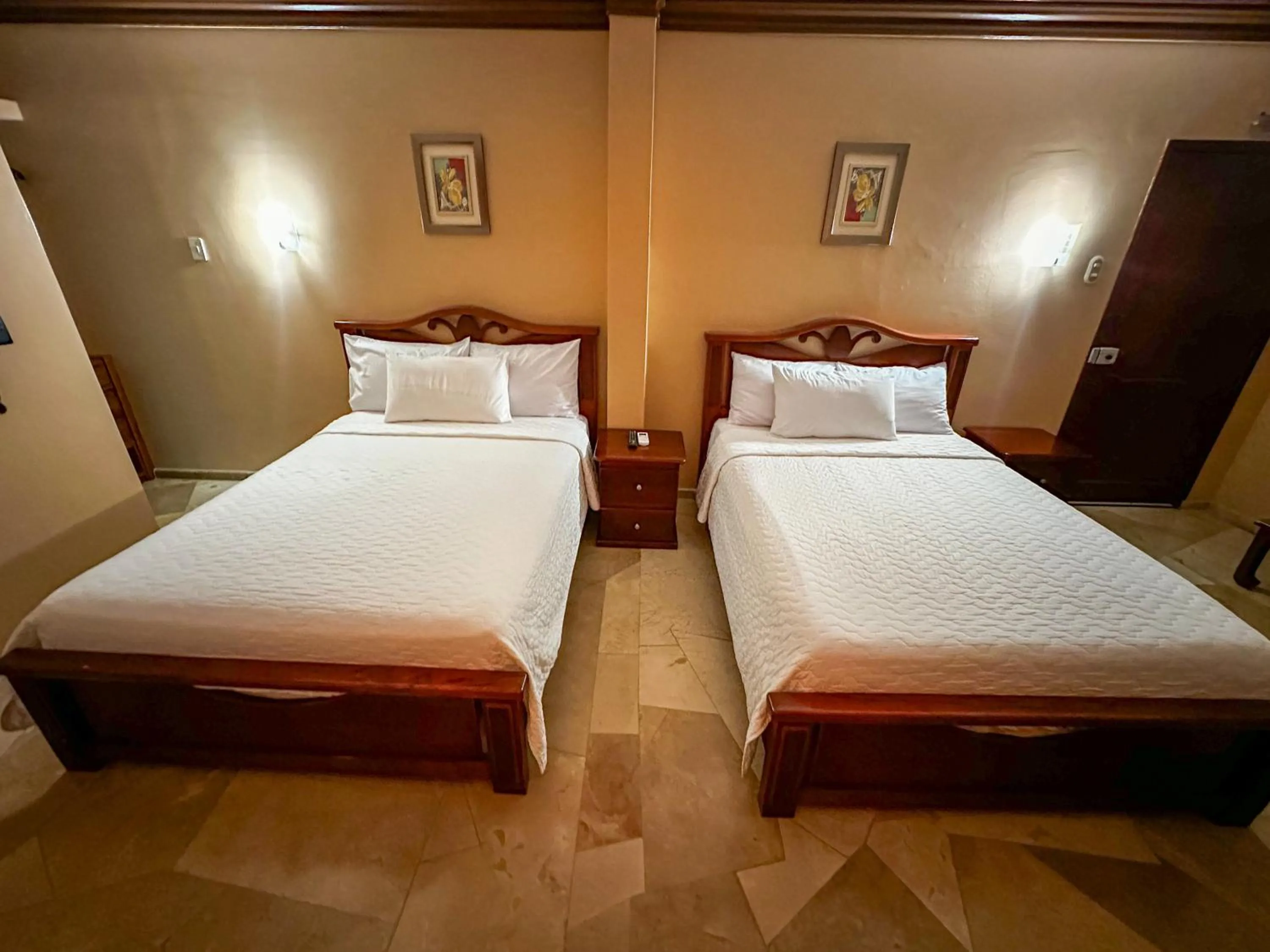 Bed in Hotel Bucaneiro