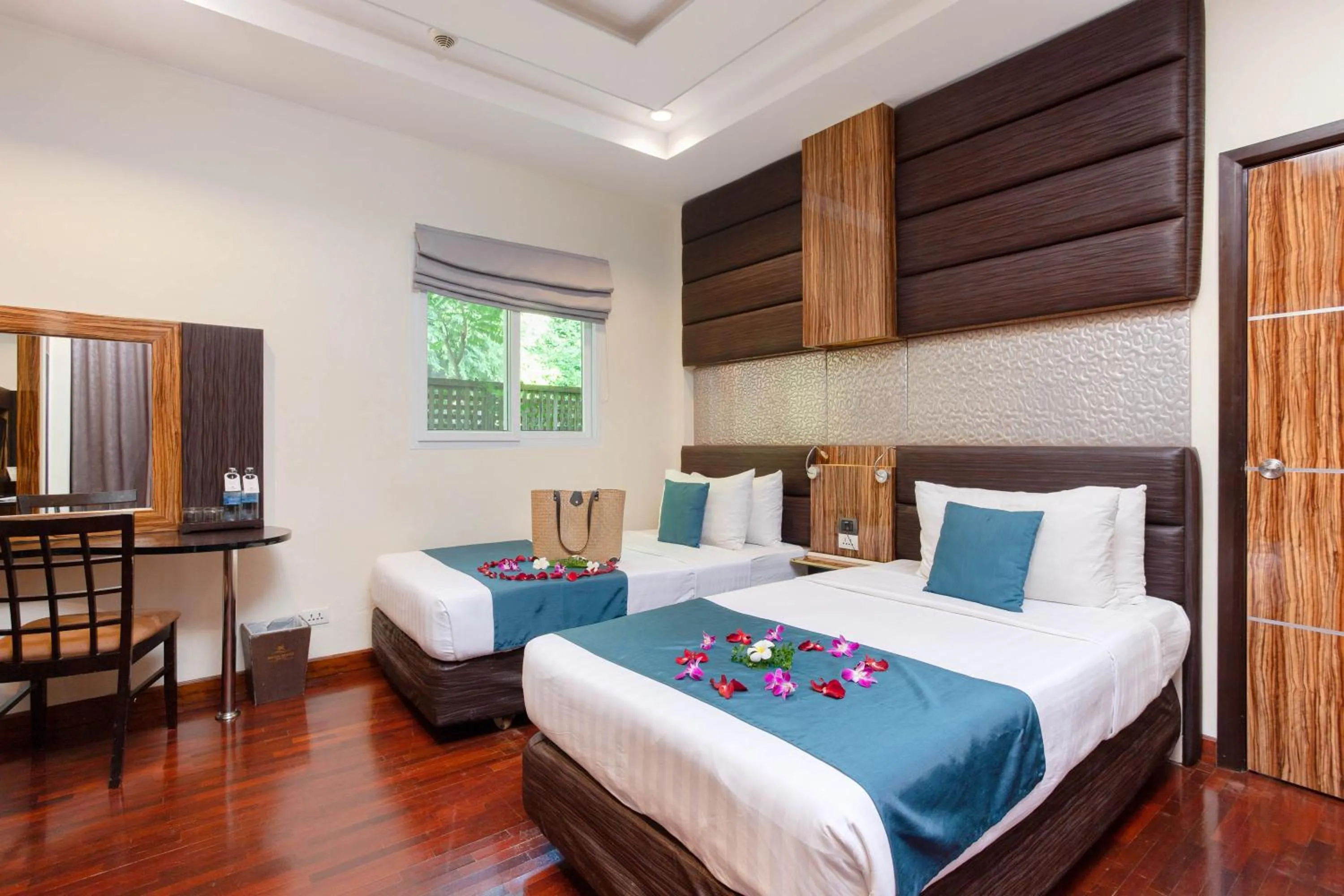 Bed in Royal Beach Boutique Resort & Spa Koh Samui