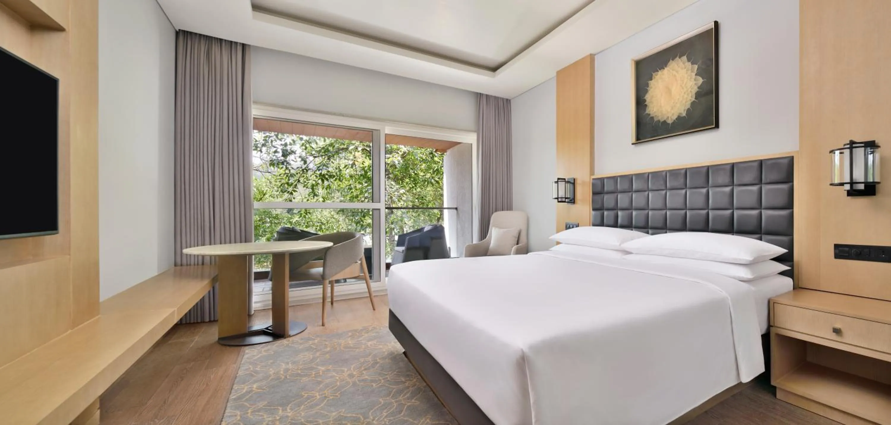 Bed in Coorg Marriott Resort & Spa