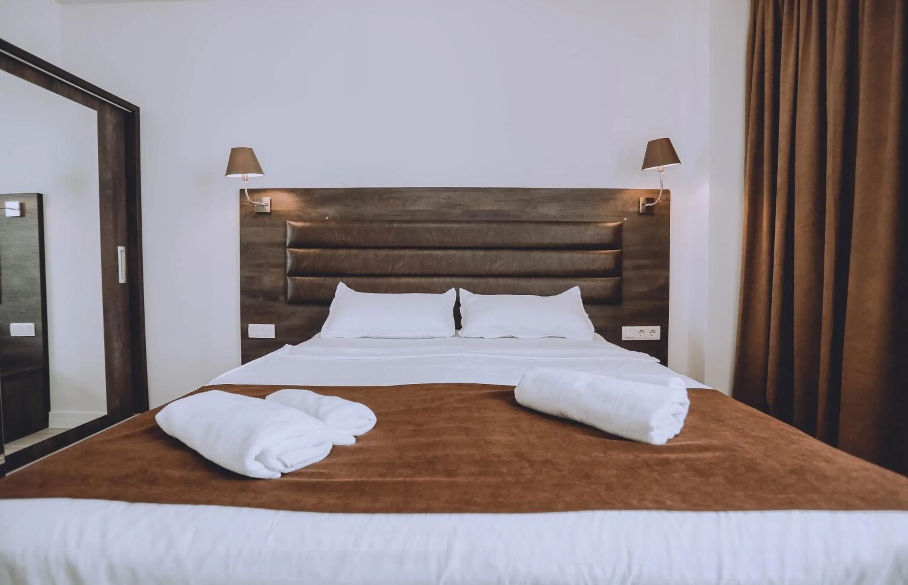 Bed in Royal Medis Hotel