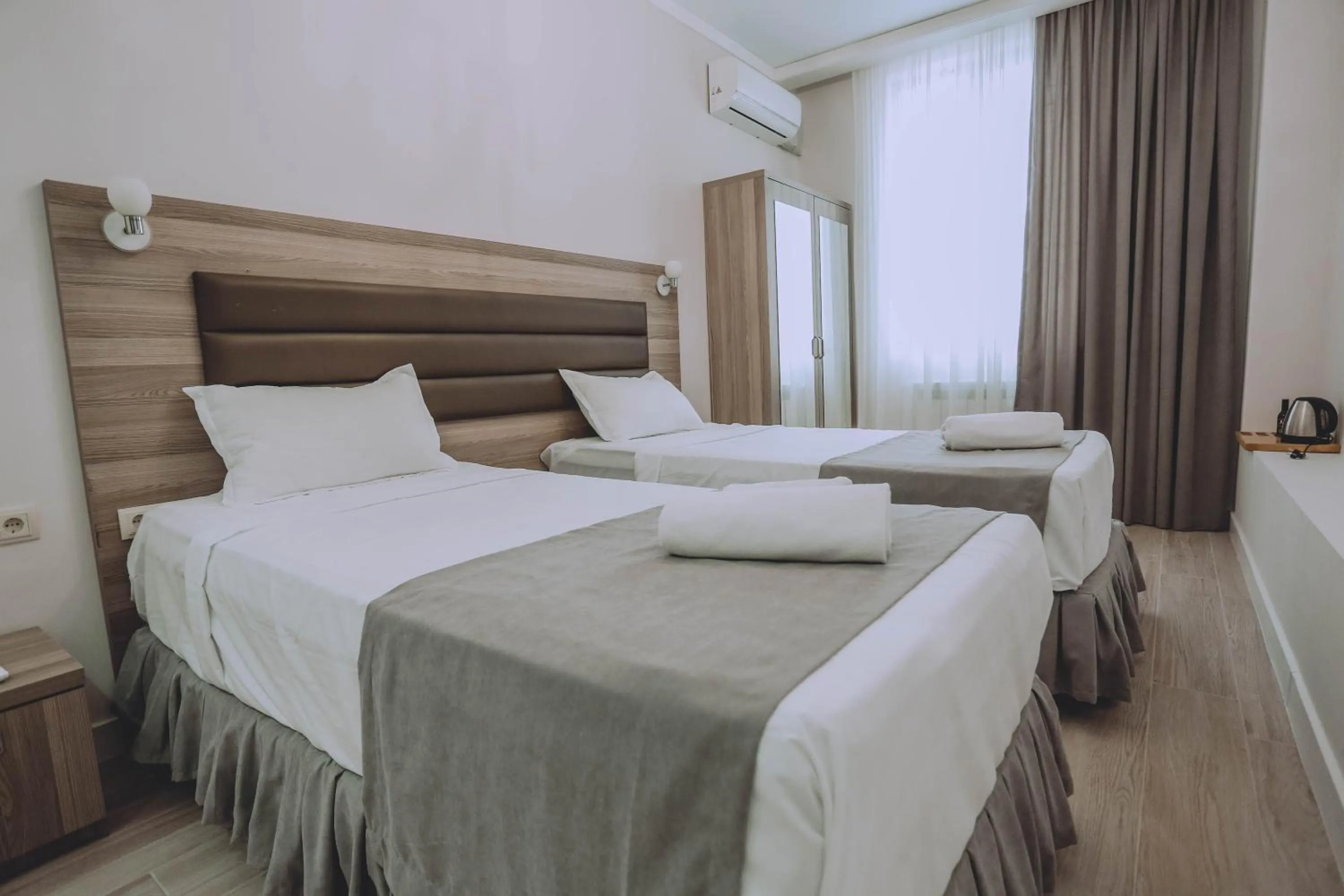 Bed in Royal Medis Hotel