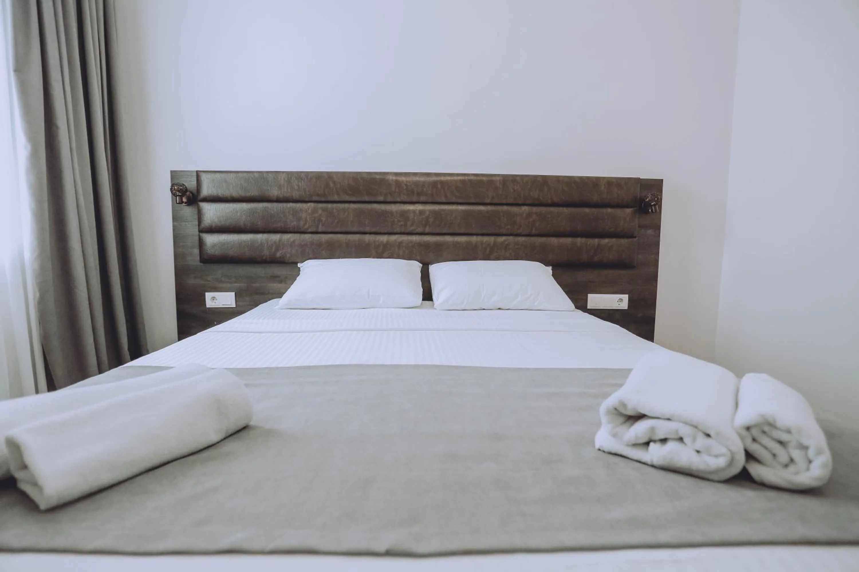 Bed in Royal Medis Hotel