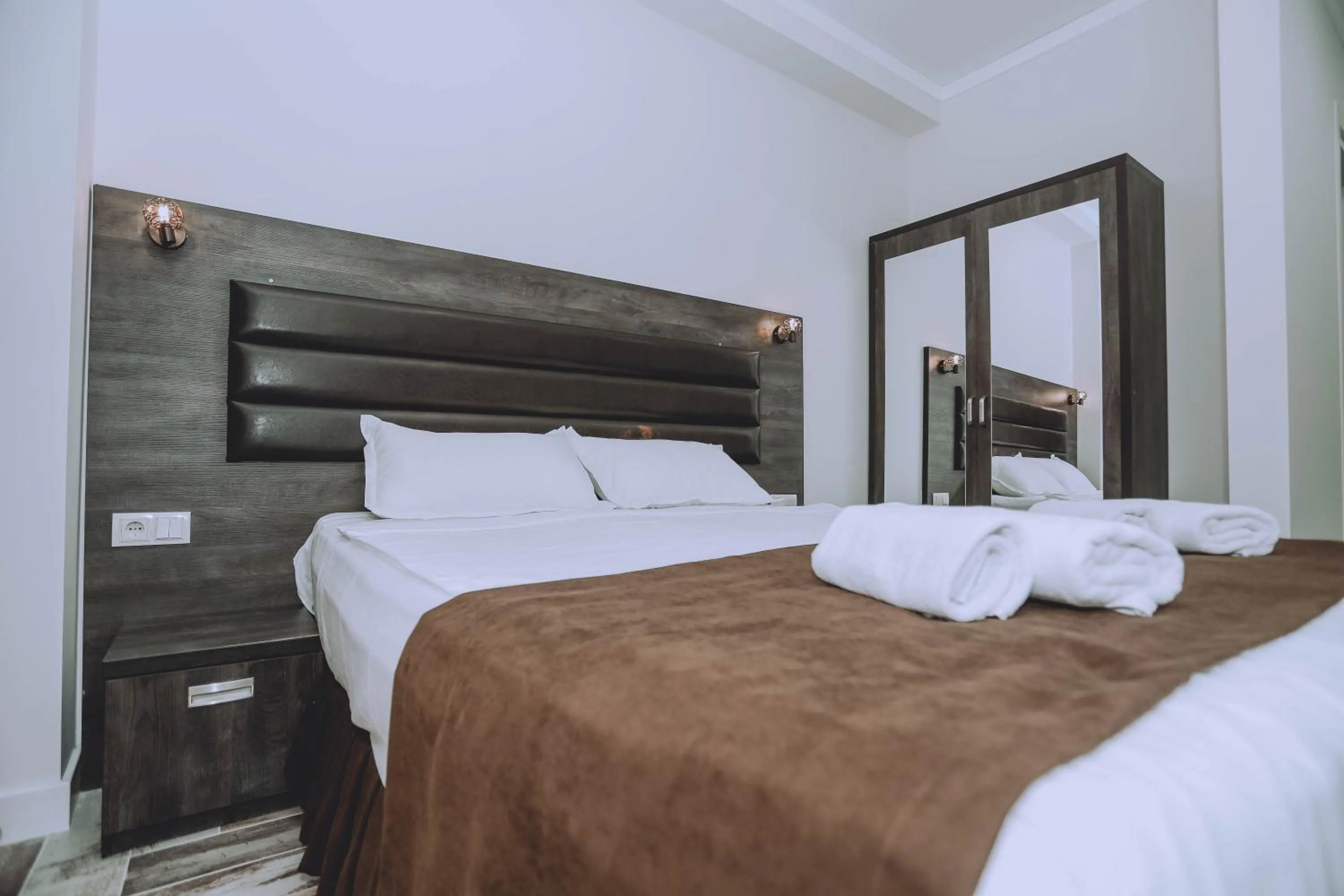 Bed in Royal Medis Hotel