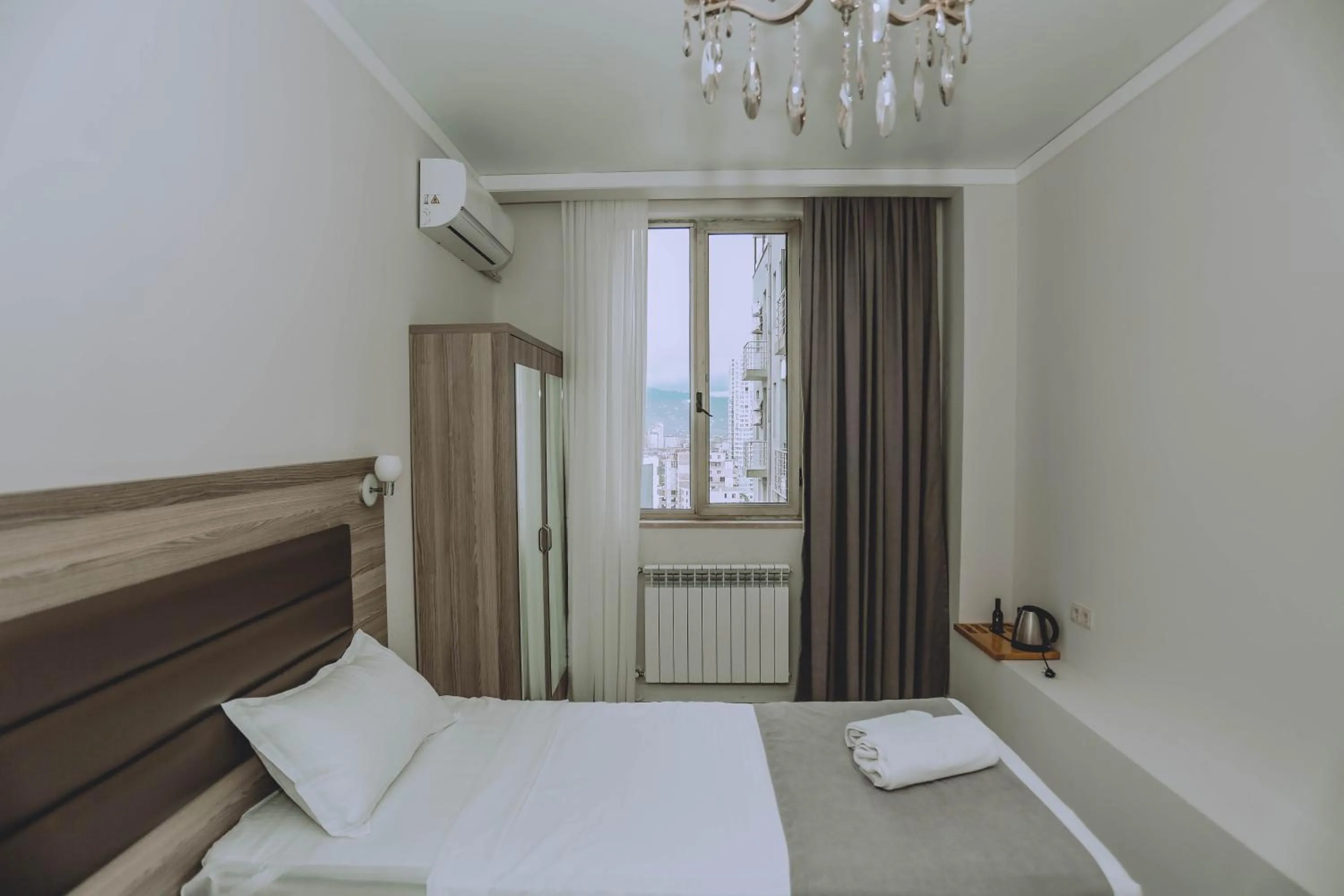 Bed in Royal Medis Hotel