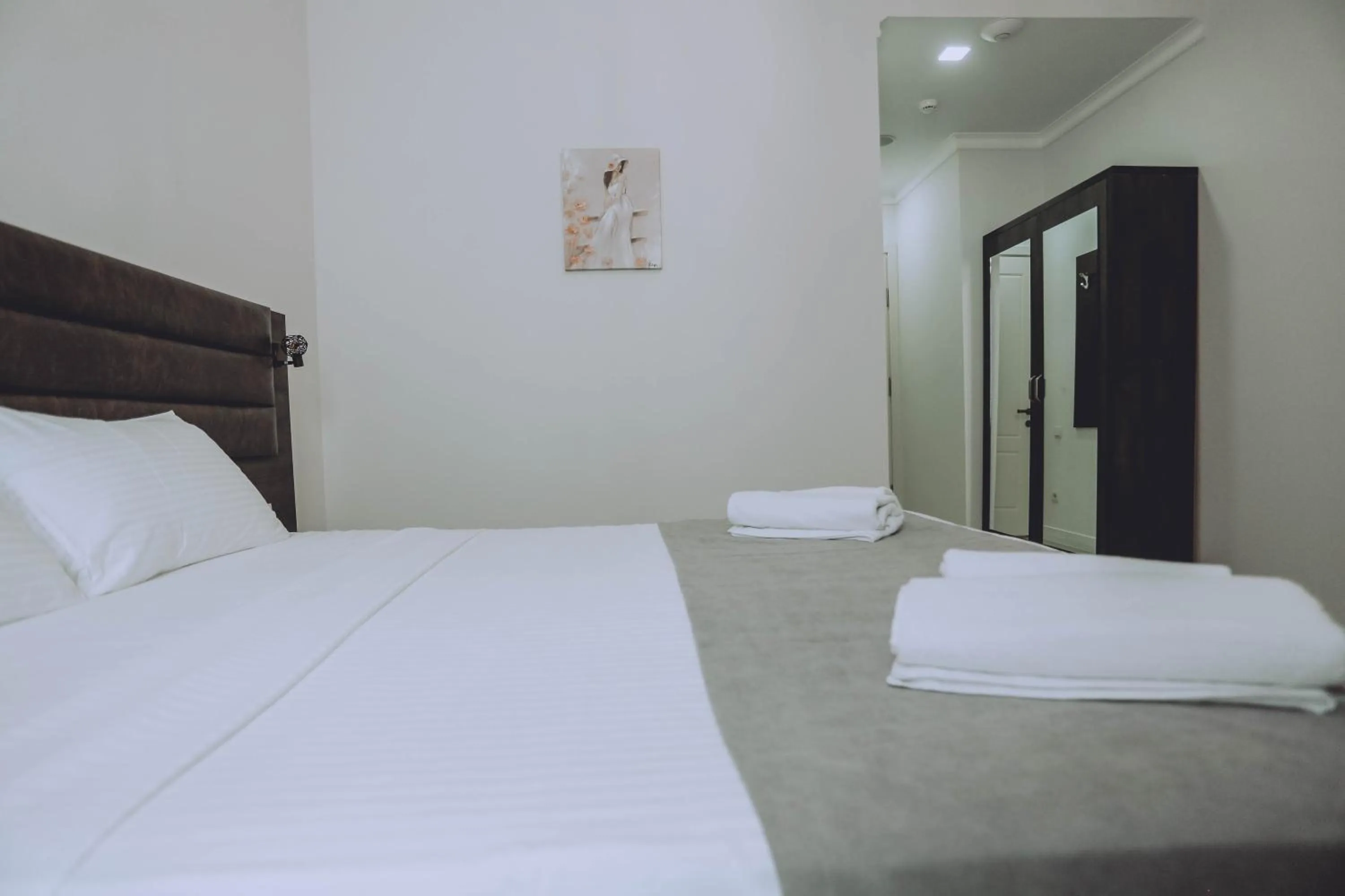 Bed in Royal Medis Hotel